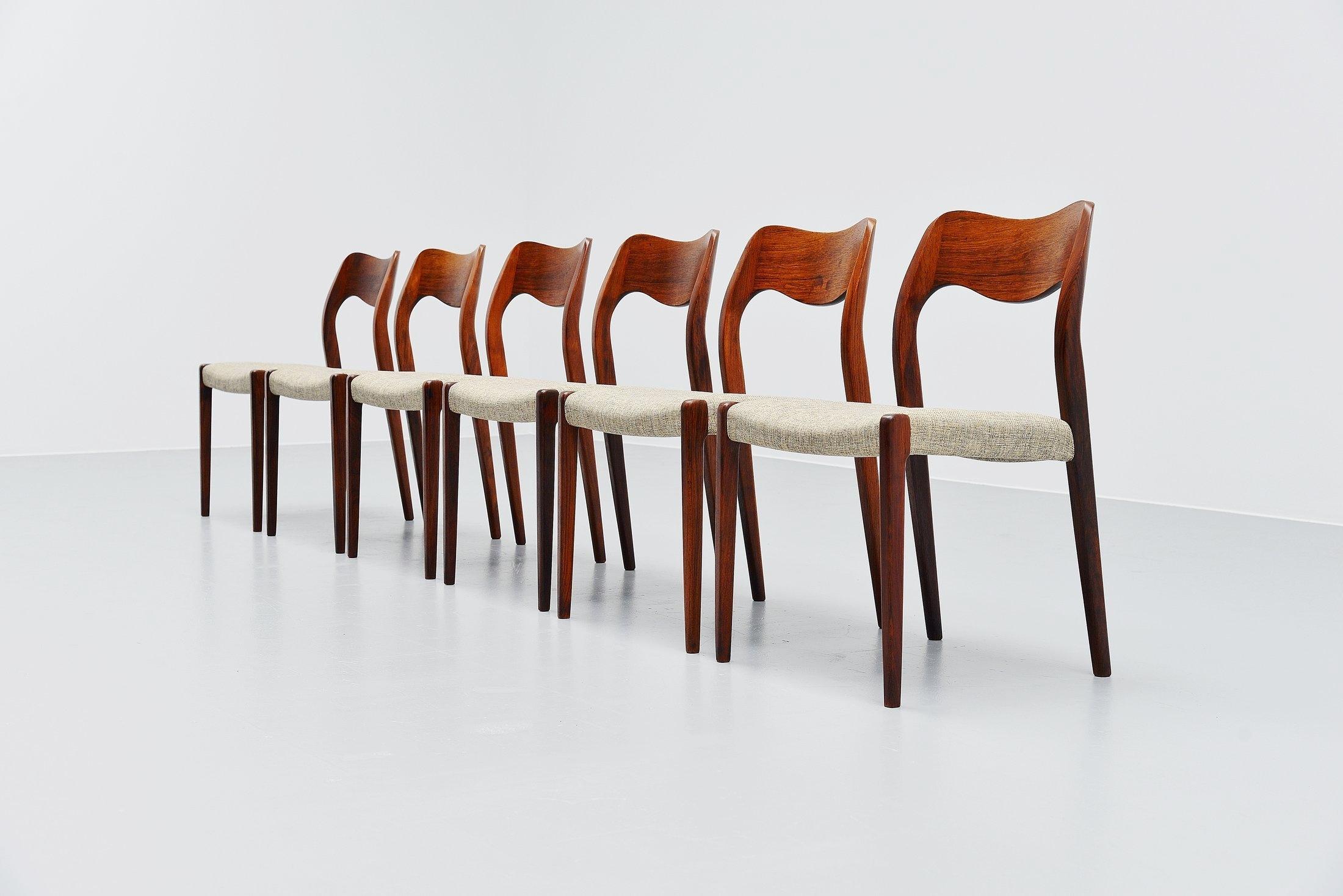 Nice set of 6 dining chairs model 71 designed by Niels Moller and manufactured by J.L. Møller Mobelfabrik, Denmark, 1951. These chairs are made of solid rosewood and are newly upholstered with waterproof upholstery, especially for dining room chairs