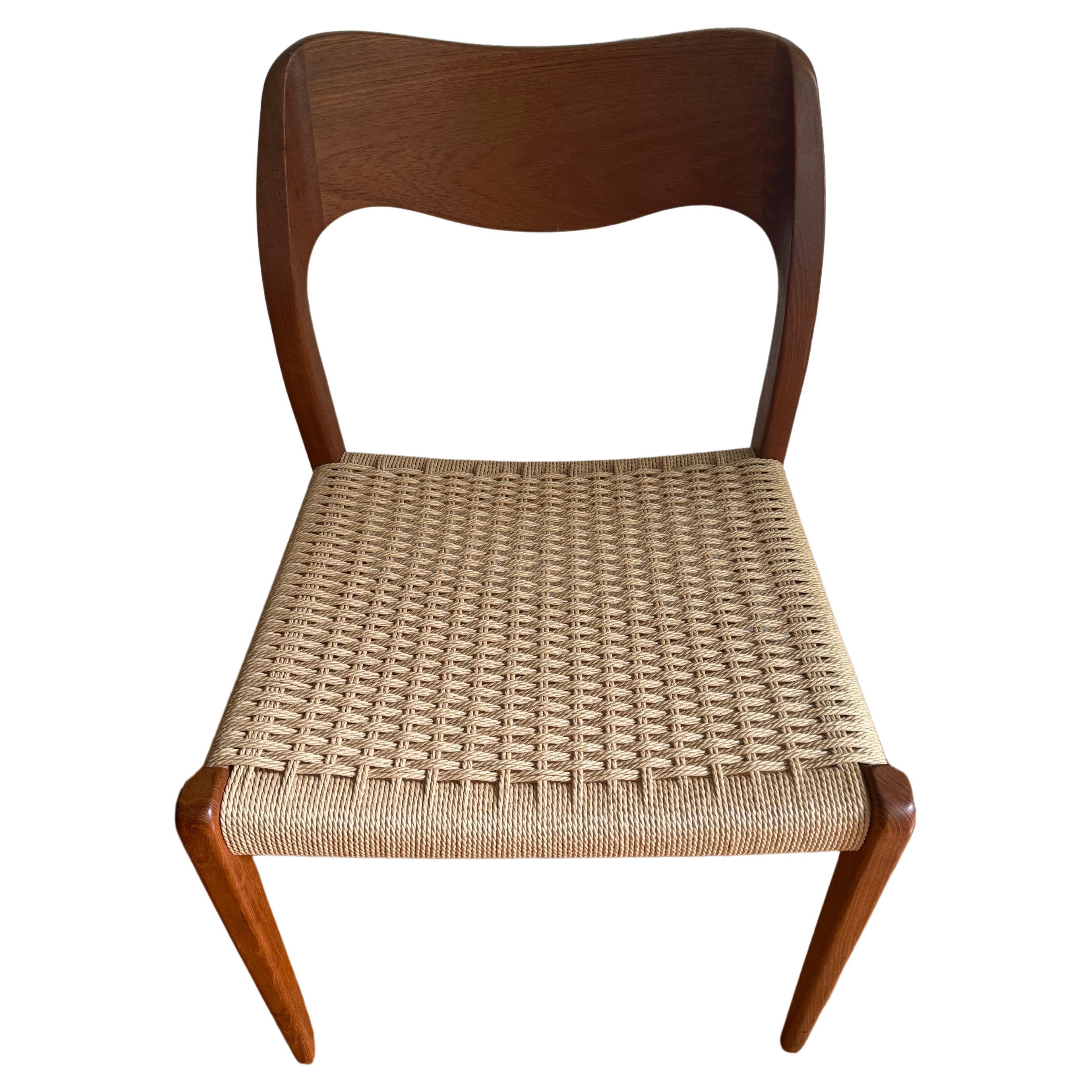 Fantastic Niels O. Møller Model 71 dining chair. Sculptural hardwood teak frame and Danish cord seats. New Danish cord was just completed. 

Made in Denmark and designed in 1951 by famed 20th century Danish designer Niels Otto Møller. Perfect for