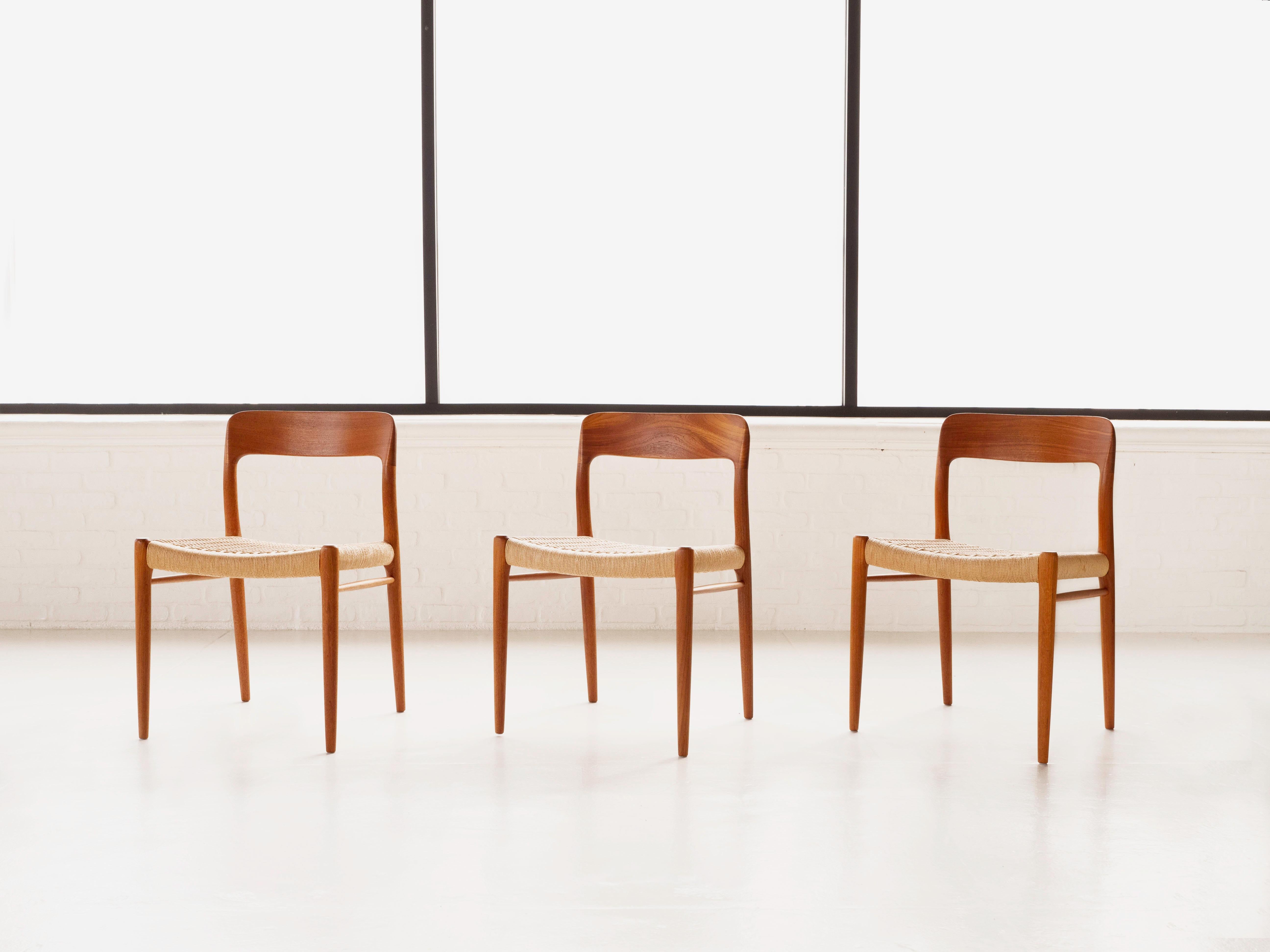 A set of nine (9) solid teak dining chairs by designer Niels Moller for J.L. Mollers Møbelfabrik. Made in Denmark circa 1950's. Model number 