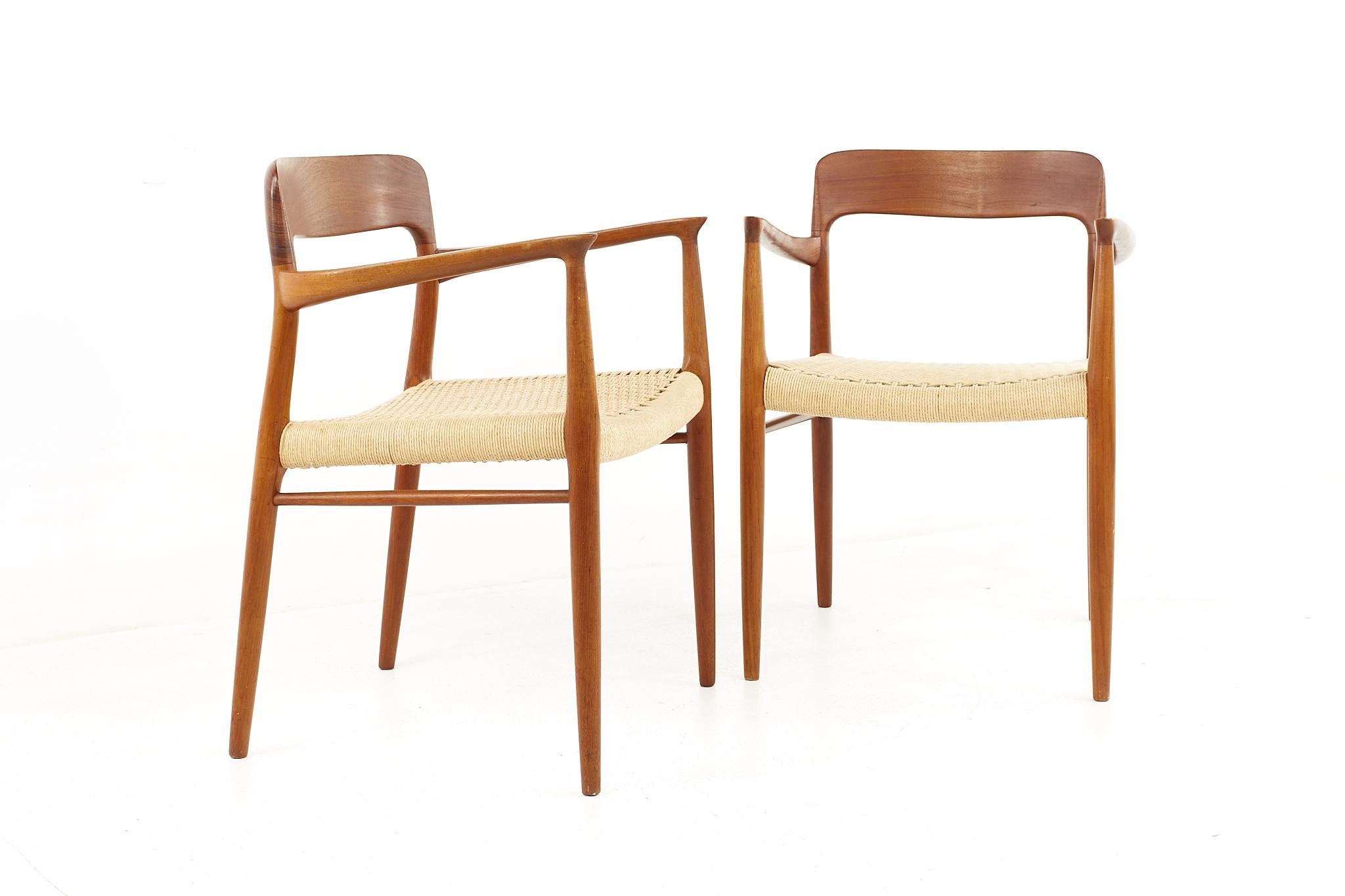 Niels Moller Model 77 mid century teak dining armchairs - a pair

Each chair measures: 22.5 wide x 19 deep x 30.5 high, with a seat height of 17 inches 

All pieces of furniture can be had in what we call restored vintage condition. That means