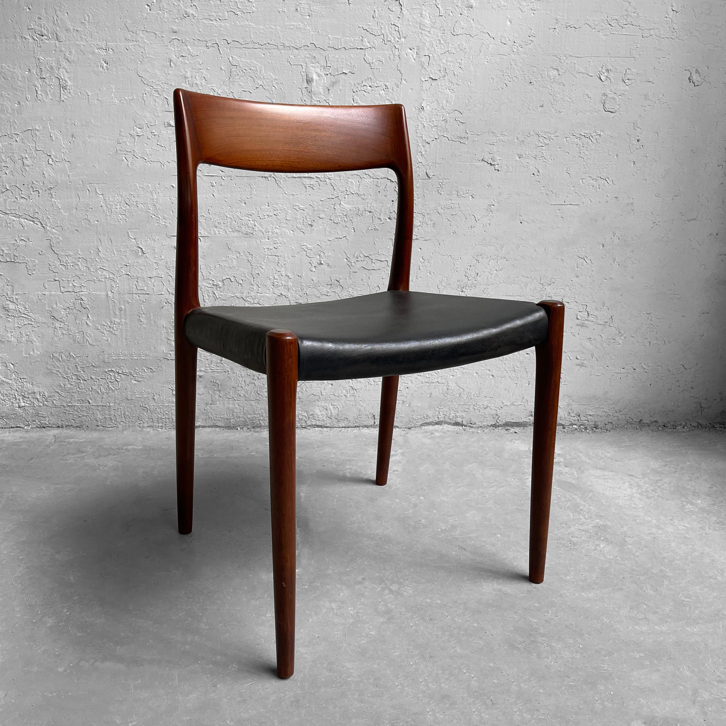 Scandinavian modern, dining or side chair by Niels Moller for J.L. Moller features a rosewood frame with black vinyl seat. This classic Danish modern chair also works as a great desk chair.