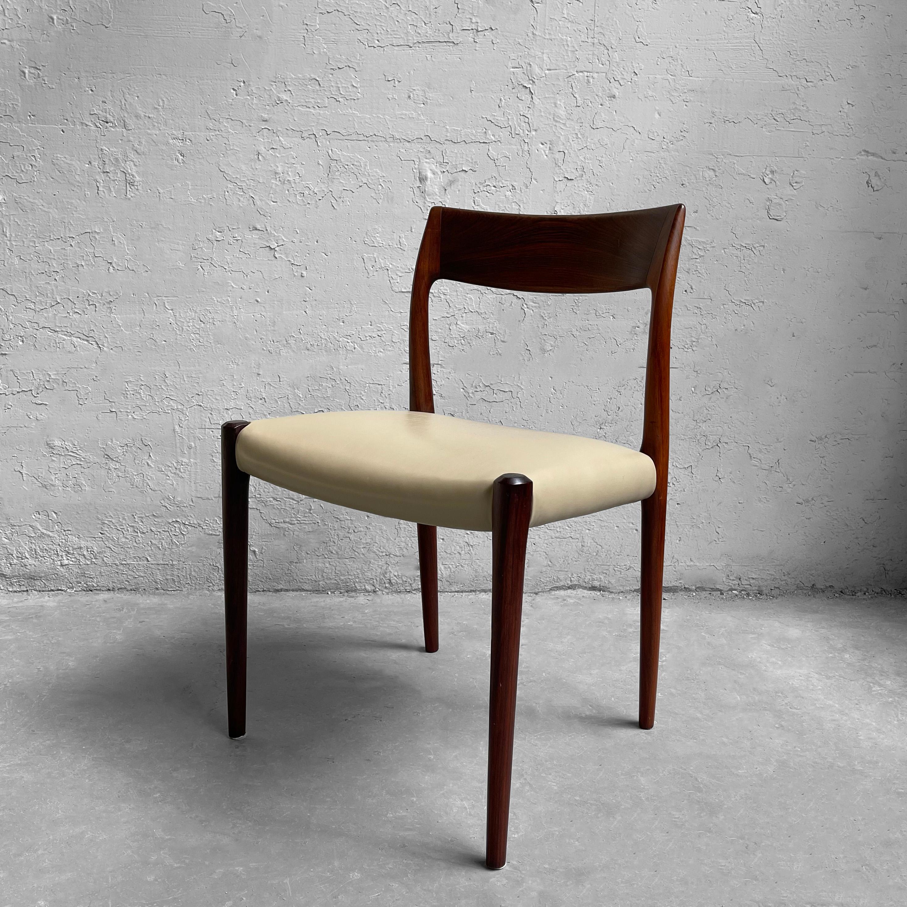 Scandinavian modern, dining or side chair by Niels Moller for J.L. Moller features a rosewood frame with newly upholstered cream leather seat. This Classic Danish modern chair also works as a great desk chair.