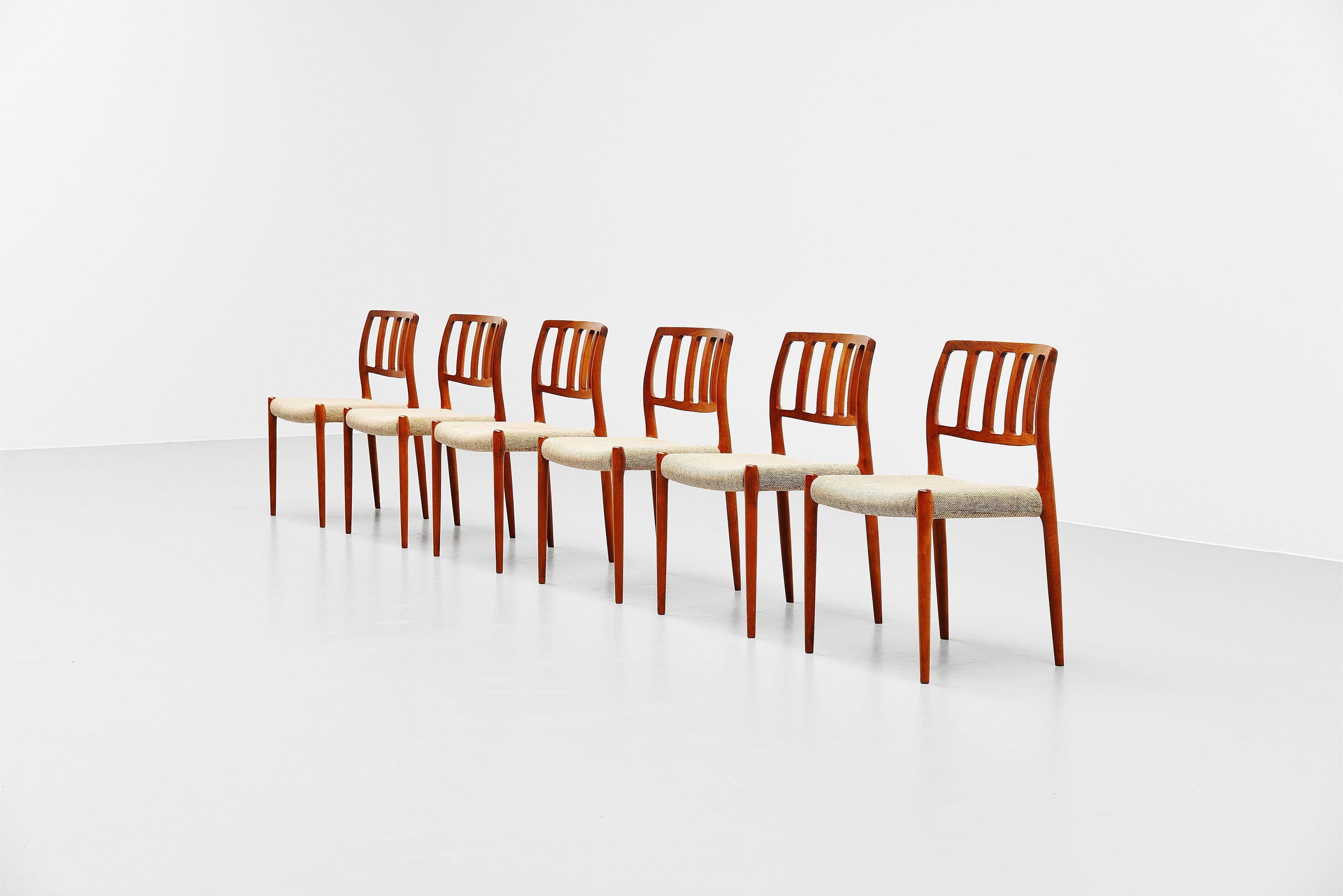 Very nice and elegant set of dining chairs model 83 designed by Niels Moller and manufactured by J.L. Moller Mobelfabrik, Denmark 1974. The chairs have a solid teak wooden frame and original beige upholstery which is advised to be changed. The