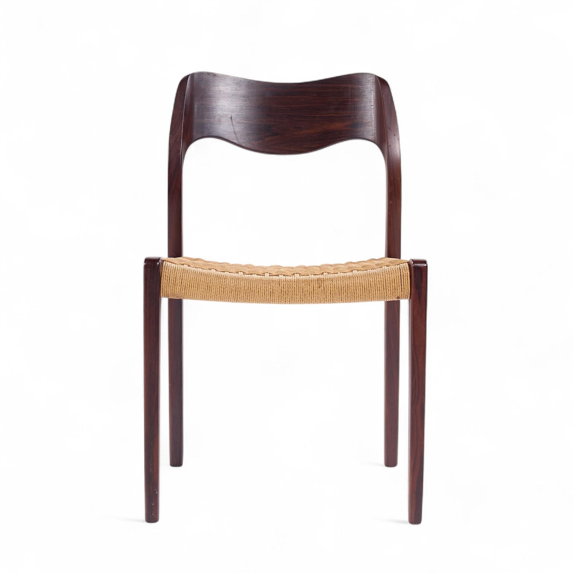 Niels Moller Model Mid Century Danish Rosewood and Cord Dining Chair

This chair measures: 19.5 wide x 20 deep x 31.5 inches high, with a seat height/chair clearance of 18 inches

We take our photos in a controlled lighting studio to show as much