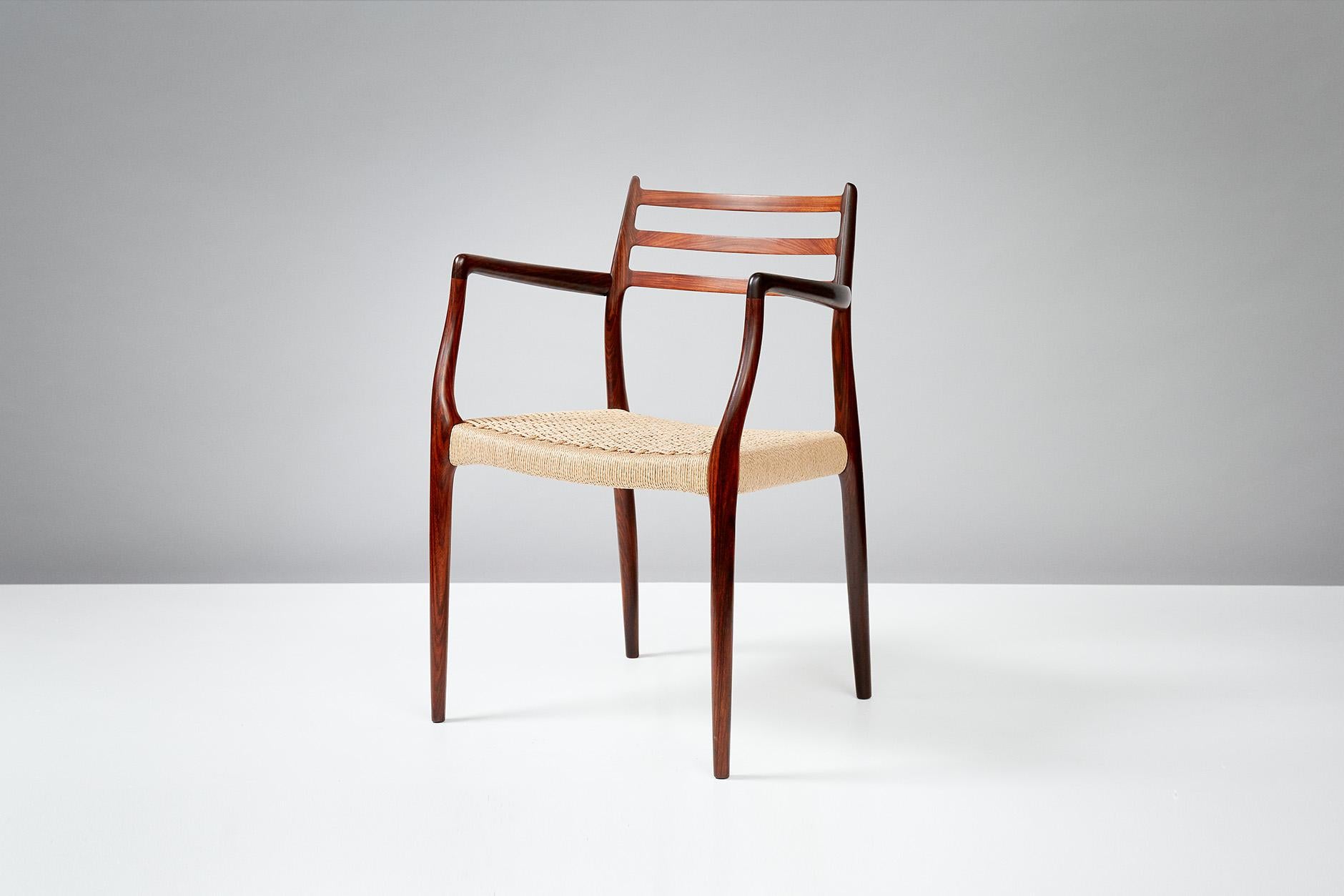 Niels Moller

Model 62 Armchair & Model 78 Side Chair Set, 1962

Chairs designed by Niels Moller for J.L. Moller Mobelfabrik, Denmark, 1962 with newly woven papercord seats. 
