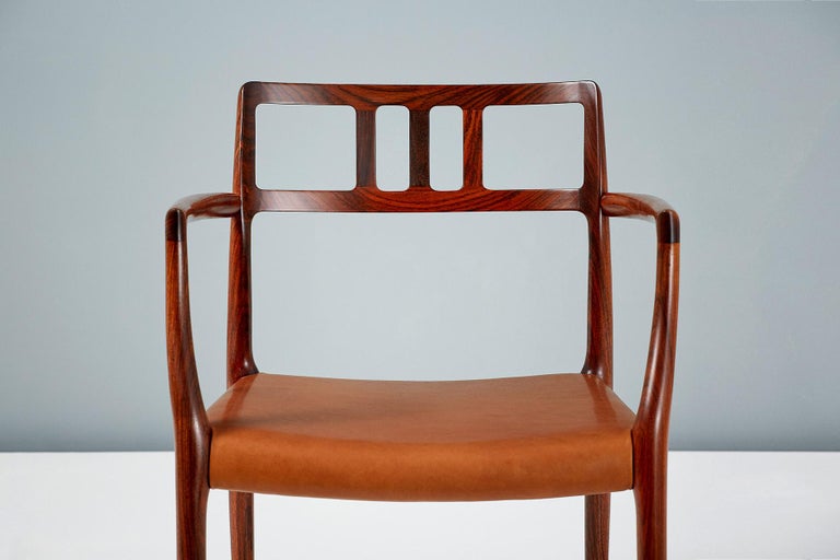 Niels Moller

Rosewood model 64 armchair, designed in 1966 by Niels Moller and produced by his own company: J.L. Moller Mobelfabrik in Denmark. The frame has been professionally restored by our in-house team and the seat has been reupholstered in