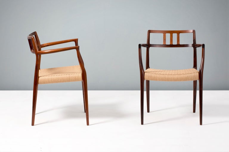 Niels Møller

A rarely seen pair of model 64 armchairs, designed in 1966 by Niels Møller for his own company J.L. Møller Møbelfabrik in Denmark. The frames are made from highly-figured, solid rosewood that have been refinished in our London