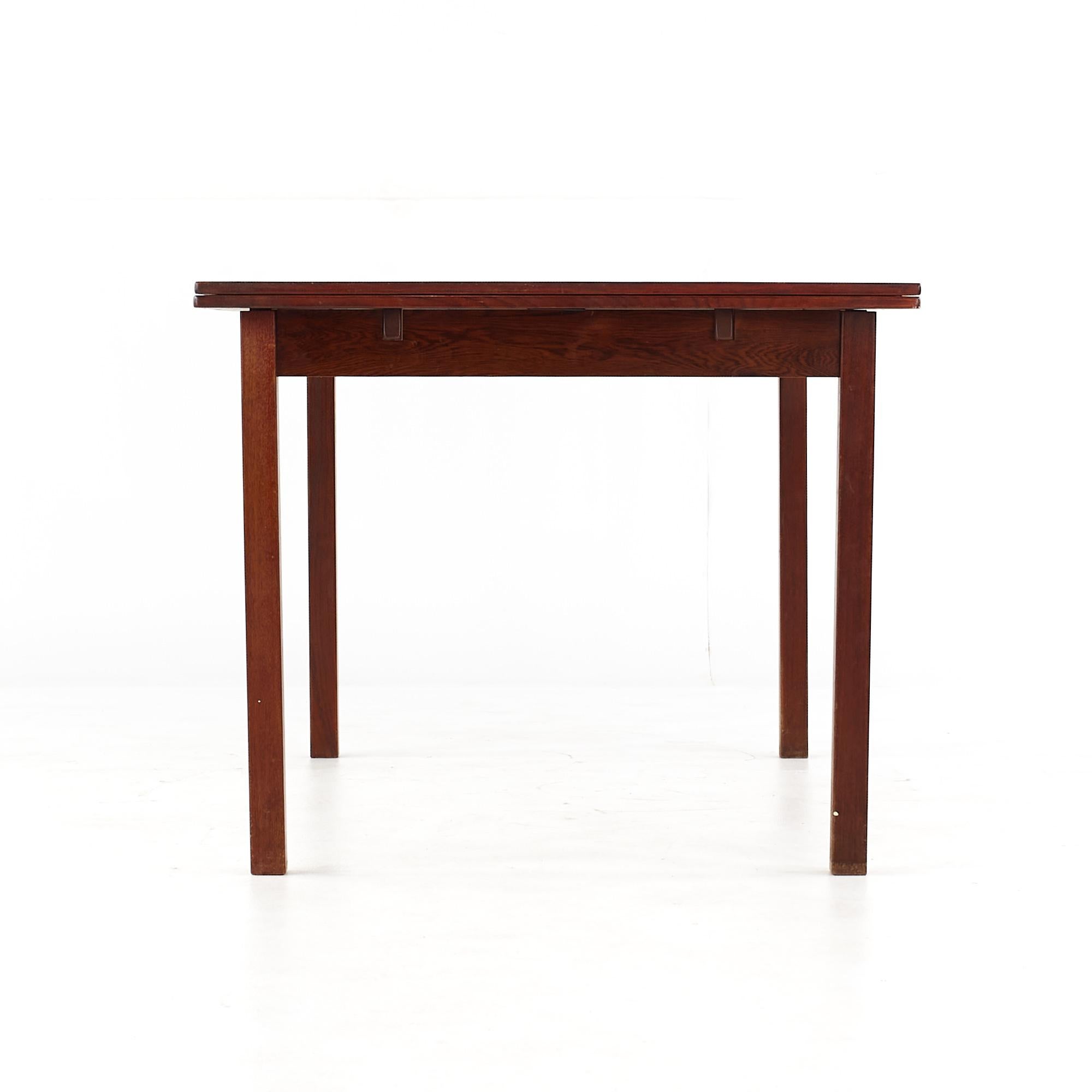 Danish SOLD 01/11/24 Niels Moller Style Mid Century Rosewood Hidden Leaf Dining Table For Sale