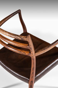 Niels O. Møller Armchair Model 62 Produced by J.L Møllers Møbelfabrik in Denmark