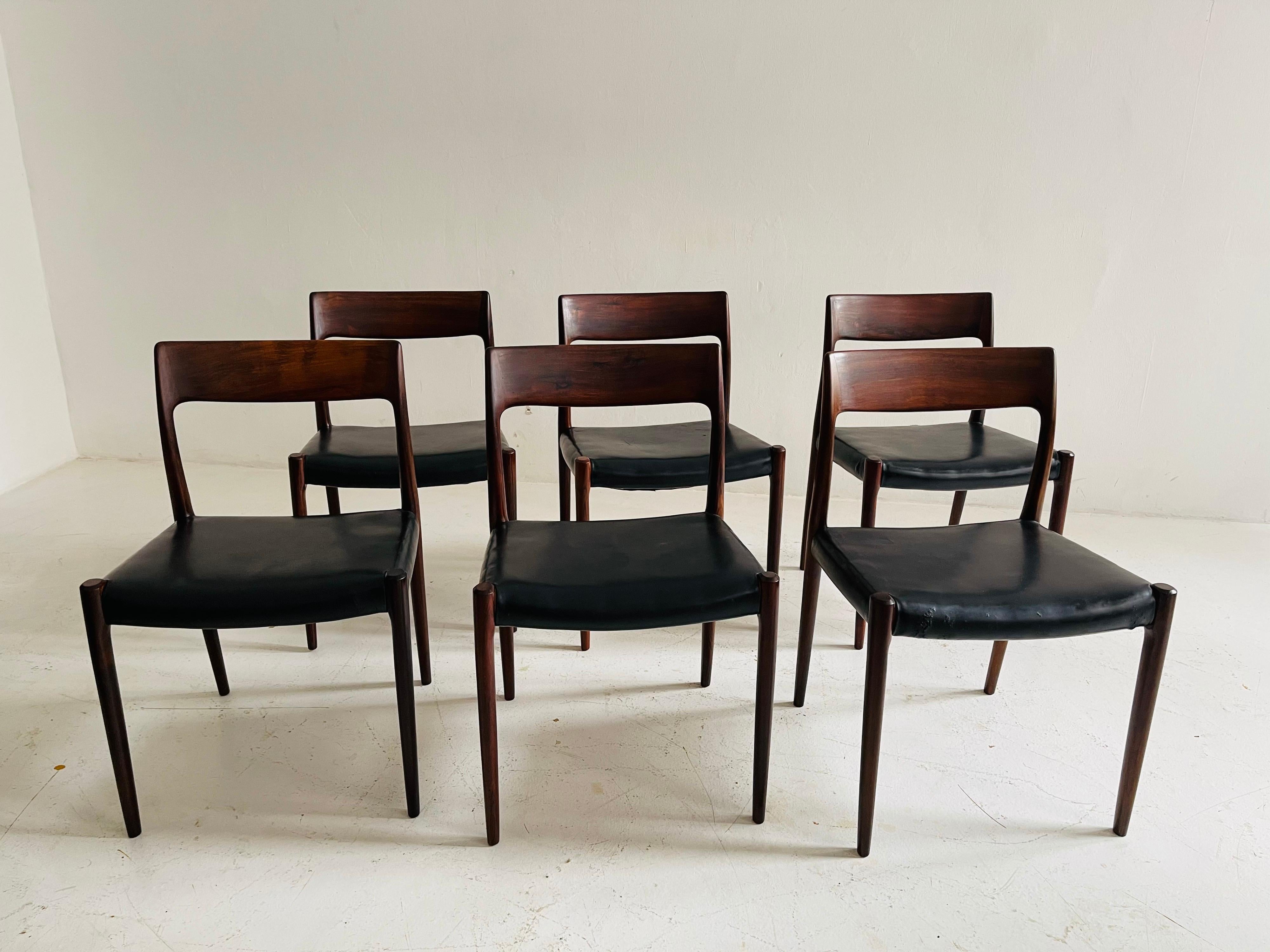 Niels O. Møller dining chairs no 77 set of six by Møllers Møbelfabrik in Denmark. Original patinated leather seats.