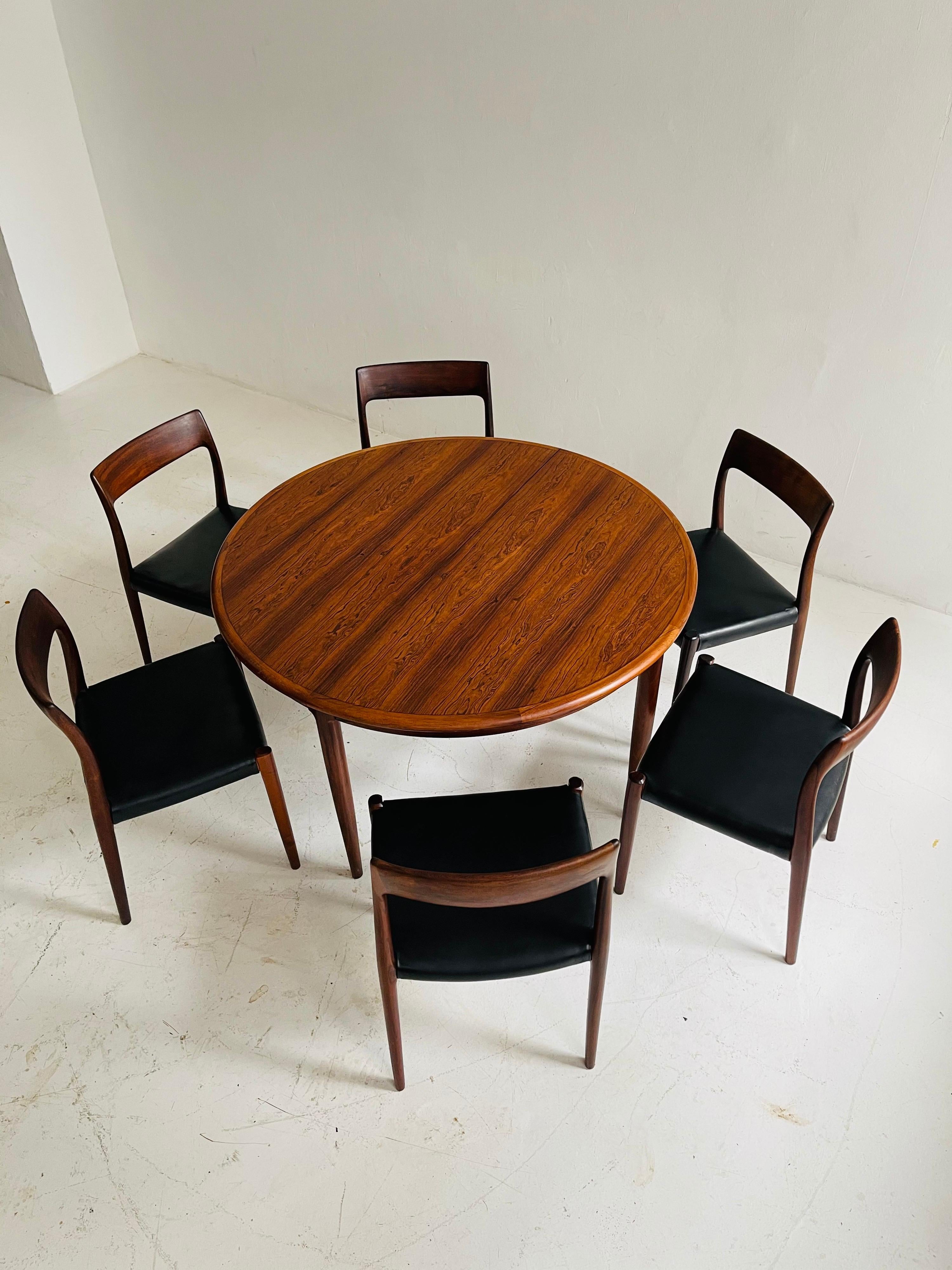 Niels O. Møller dining chairs No 77 set of six by Møllers Møbelfabrik in Denmark and matching Niels O. Møller dining table Produced by J.L. Møllers Møbelfabrik in Denmark, 1960s.