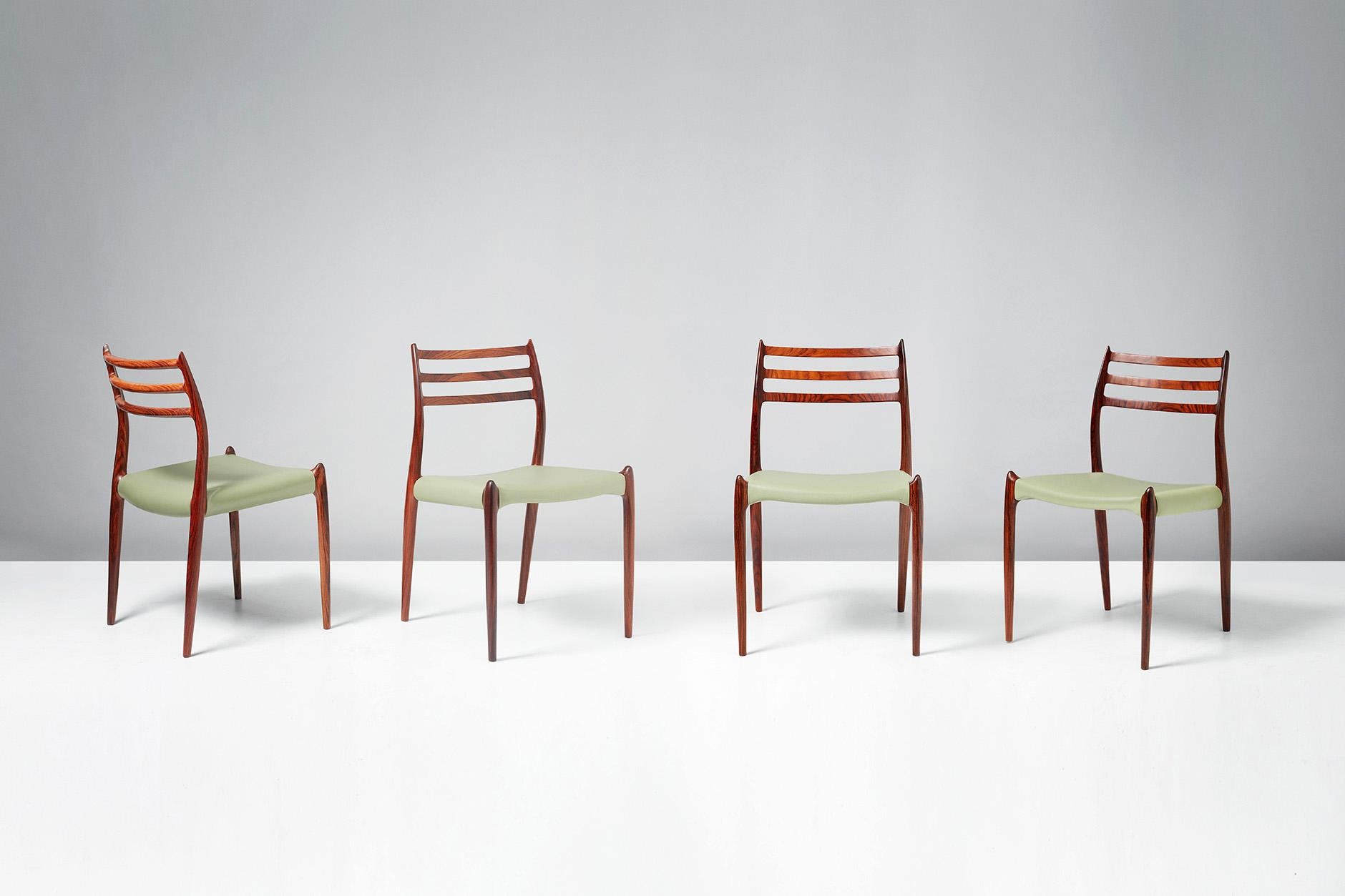 Niels O. Møller

Model 78 dining chairs, 1962.

Set of eight rosewood dining chairs designed by Niels O. Møller for J.L. Moller Mobelfabrik, Denmark, 1962. Seats reupholstered in premium pale green leather.

Larger sets and other upholstery