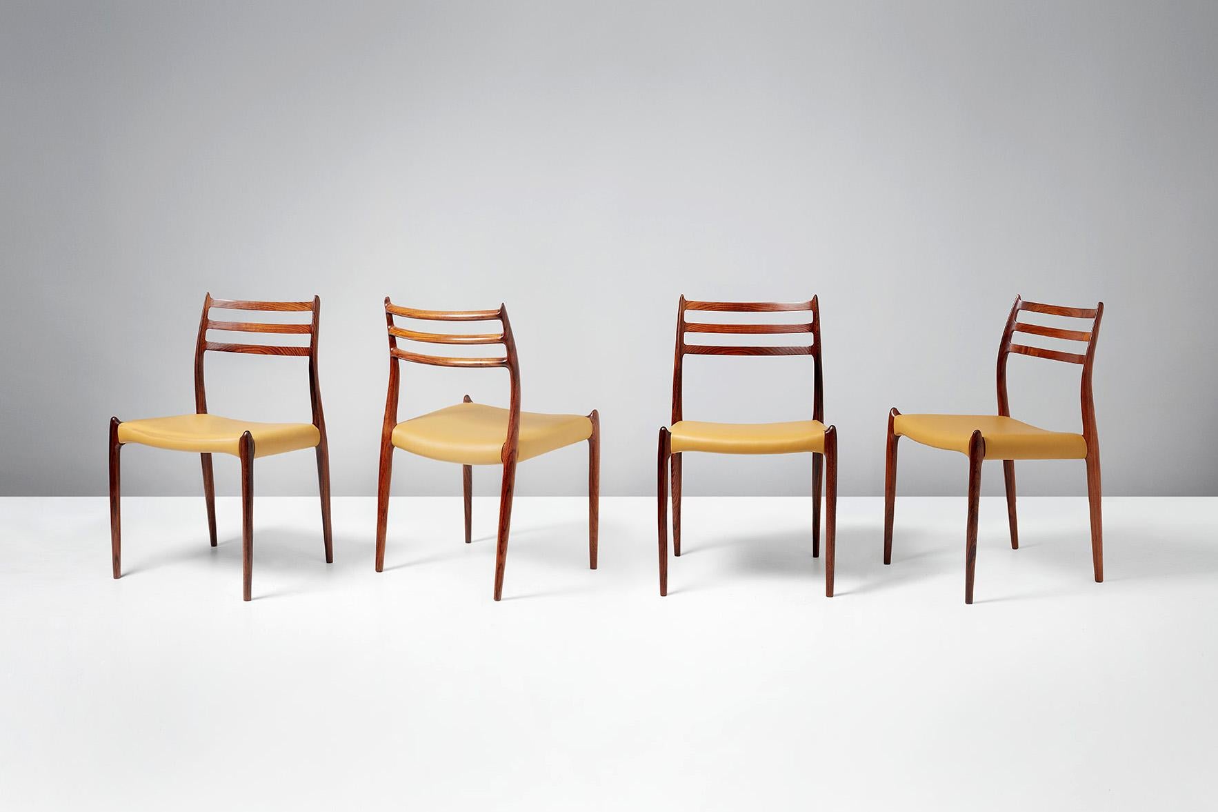 Niels O. Møller

Model 78 dining chairs, 1962.

Set of eight rosewood dining chairs designed by Niels O. Møller for J.L. Moller Mobelfabrik, Denmark, 1962. Seats reupholstered in premium golden yellow leather.

Larger sets and other upholstery