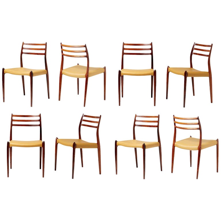 Niels O. Møller

Model 78 Dining Chairs, 1962.

Set of eight rosewood dining chairs designed by Niels O. Møller for J.L. Moller Mobelfabrik, Denmark, 1962. Seats reupholstered in premium golden yellow leather.

Larger sets and other upholstery