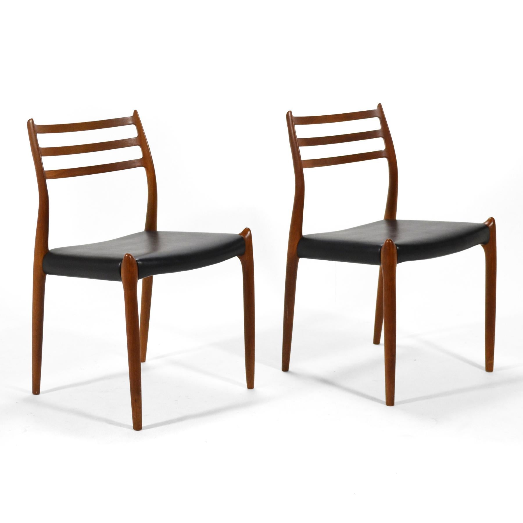 Beautiful pair of Niels Moller model 78 chairs executed in teak by J.L. Moller. The soft contours and fluid lines are as beautiful as the expert craftsmanship.