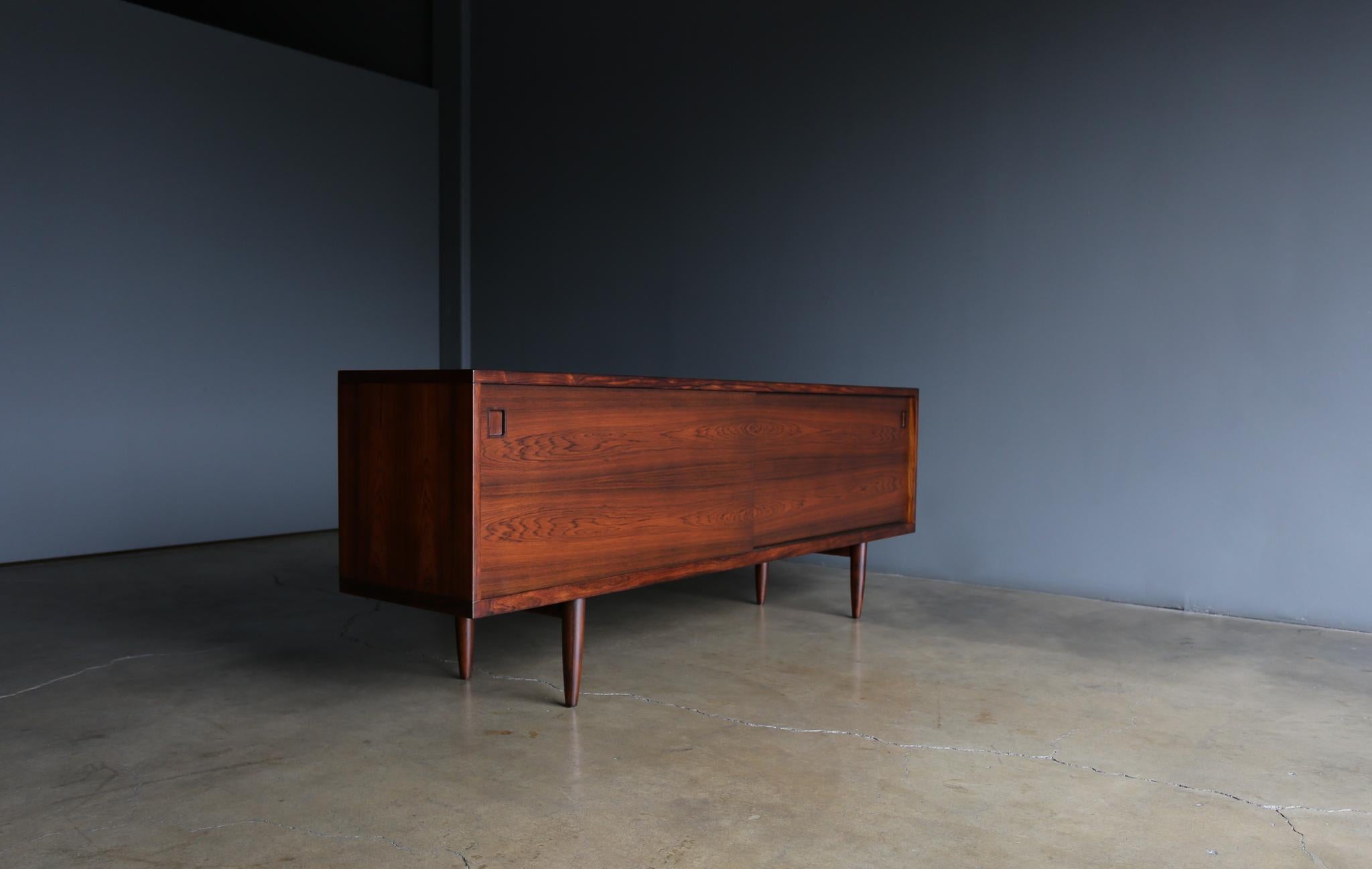 Niels O. Møller rosewood credenza for J.L. Møller Møbelfabrik, circa 1960. Highly figured rosewood grain. This piece has been professionally restored.