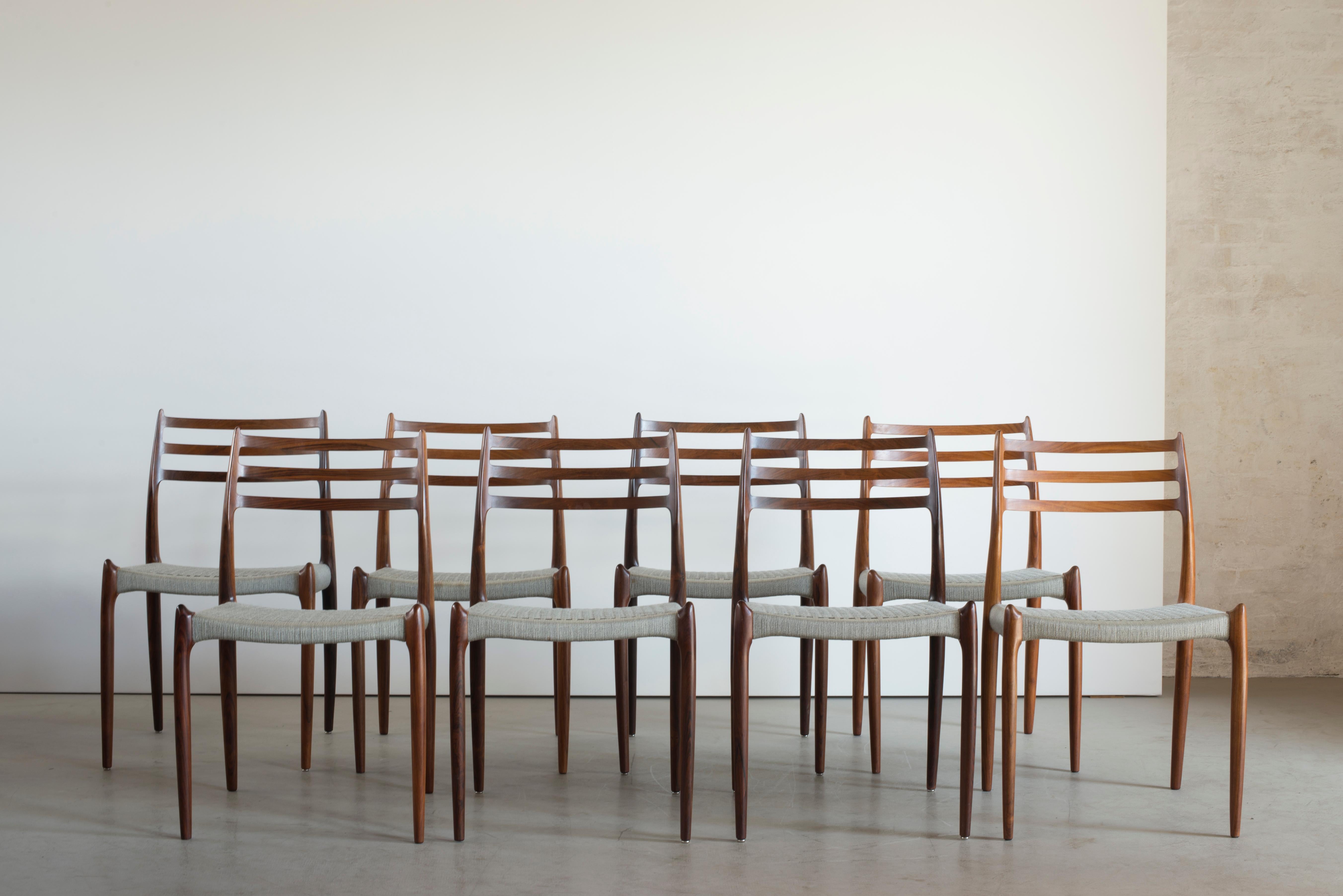 Niels O. Møller set of eight rosewood chairs, seats with grey braided wool yarn. Manufactured by J. L. Møller, Denmark.