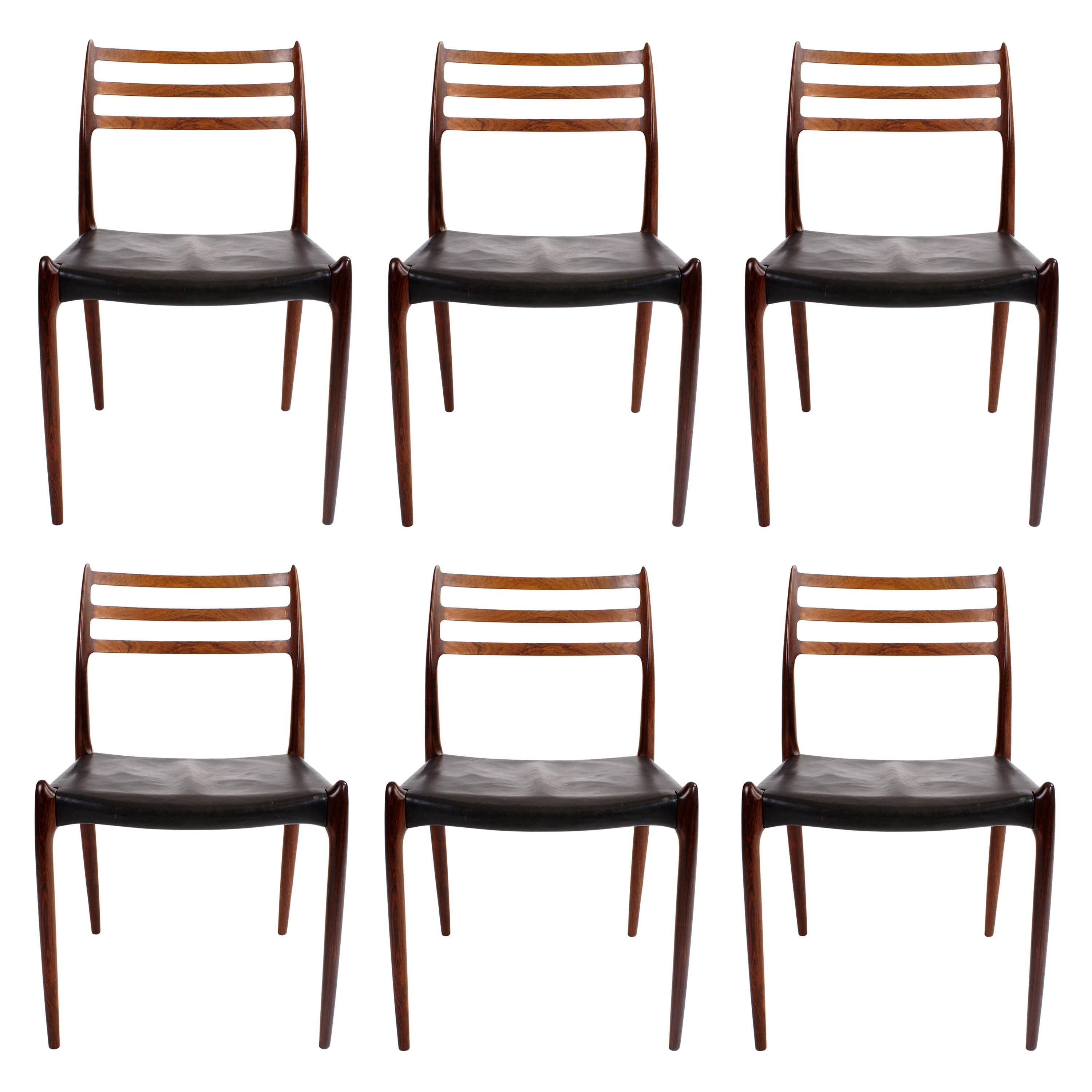 Niels O. Møller Set of Six Dining Chairs in Rosewood and Black Leather