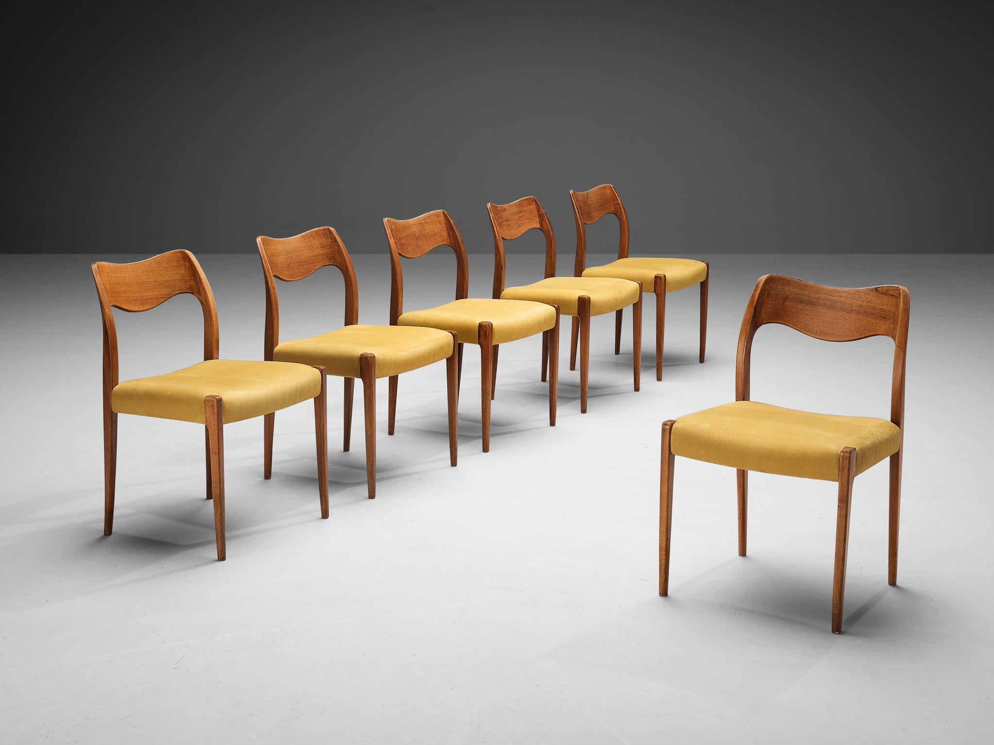 Niels O. Møller, set of six dining chairs, model 71, teak, fabric upholstery, Denmark, 1950s.

These chairs designed by Niels Møller show subtle lines and beautiful curves of the woodwork. The backs of the chairs are feature the iconic Møller waved