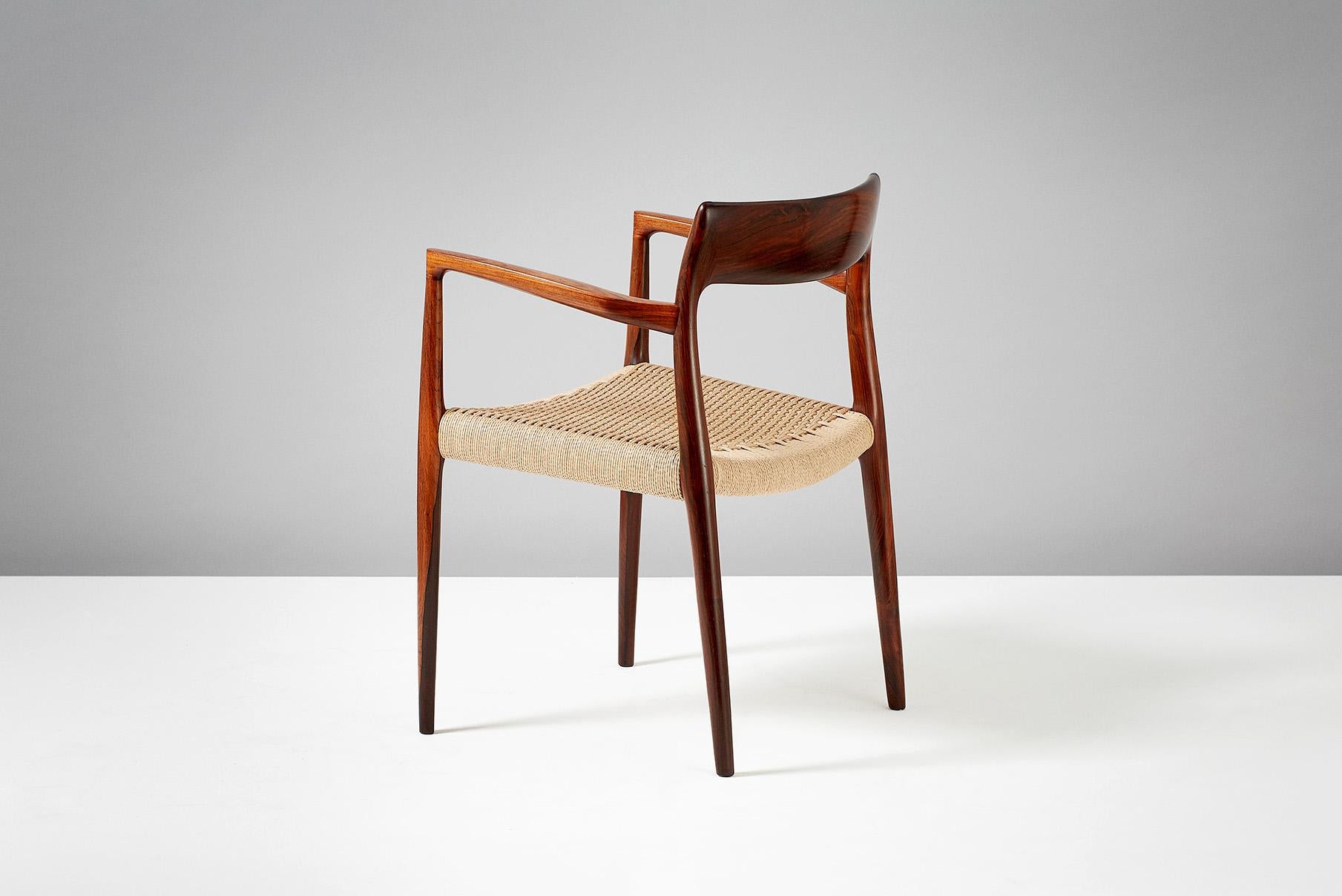 Niels O. Moller

Model 57 chair 

Solid rosewood armchair produced by J.L. Moller Mobelfabrik, Denmark, 1959. Newly woven papercord seat. 

Measures: H 77 cm / D 50 cm / W 55 cm / SH 44 cm.