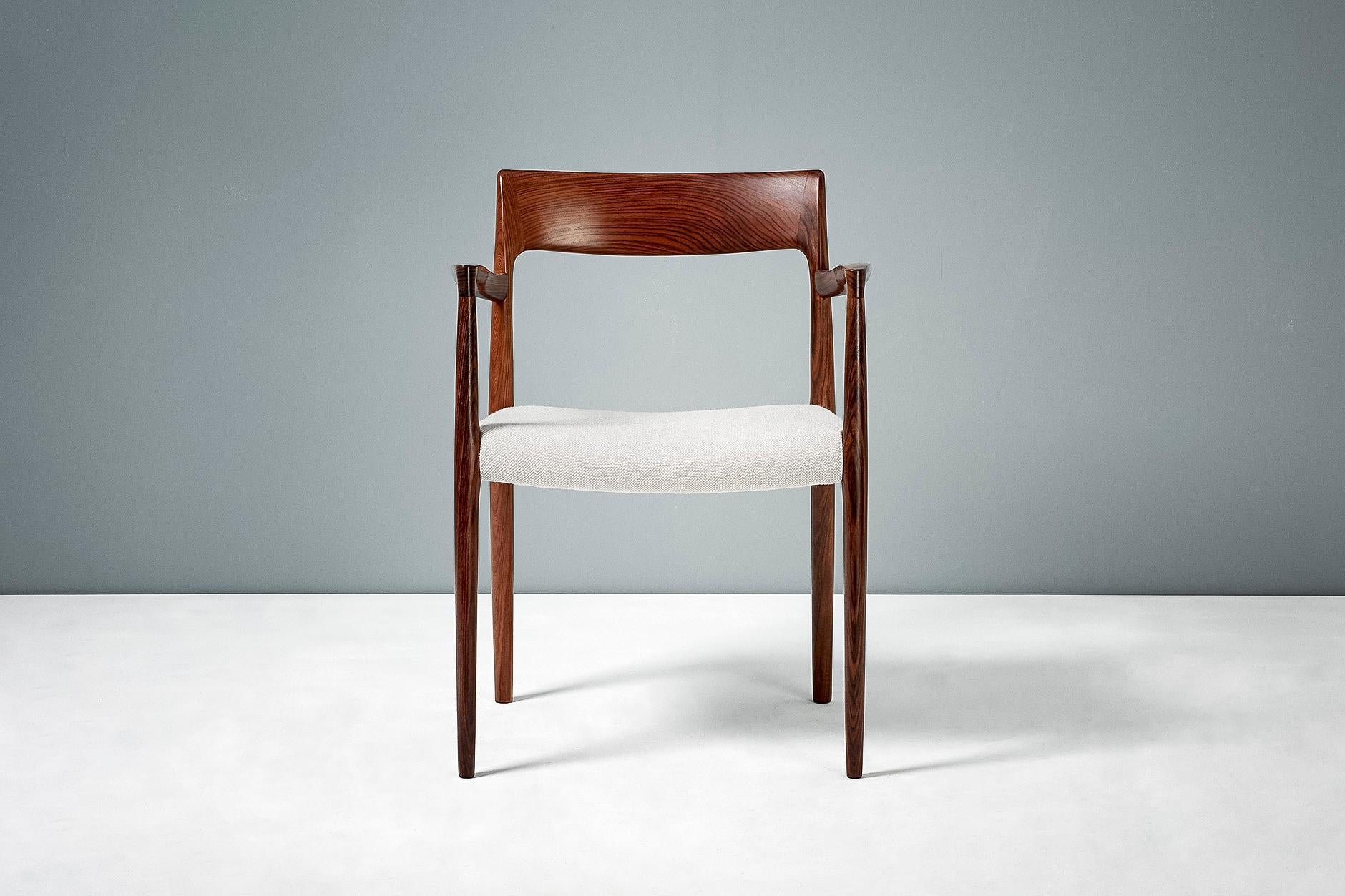 Niels O. Moller

Model 57 chair, 1959

Rosewood armchair produced by J.L. Moller Møbelfabrik, Denmark, 1959. Seat upholstered in pale wool fabric.

Measures: H 77 cm, D 50 cm, W 55 cm, SH 44 cm.

  