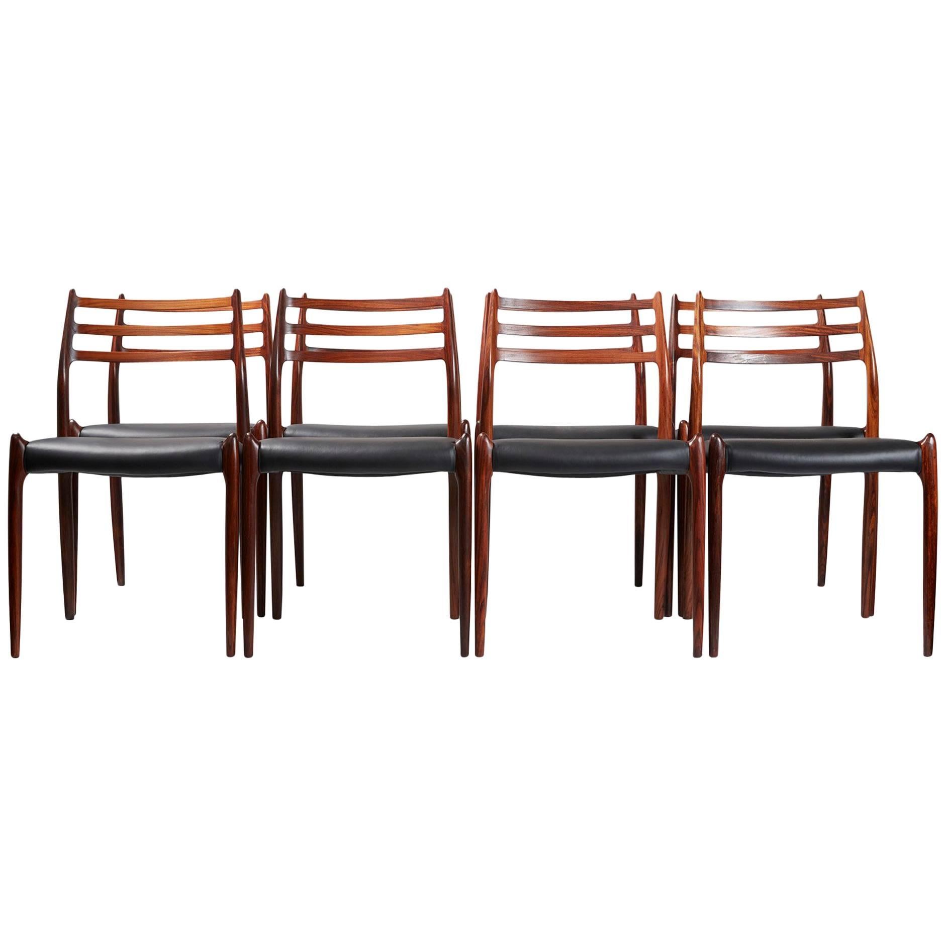 Niels O. Moller

Model 78 dining chairs, 1962

Set of eight rosewood dining chairs designed by Niels O. Moller for J.L. Moller Mobelfabrik, Denmark, 1962. Rare early productions with more slender frames. Seats reupholstered with new black