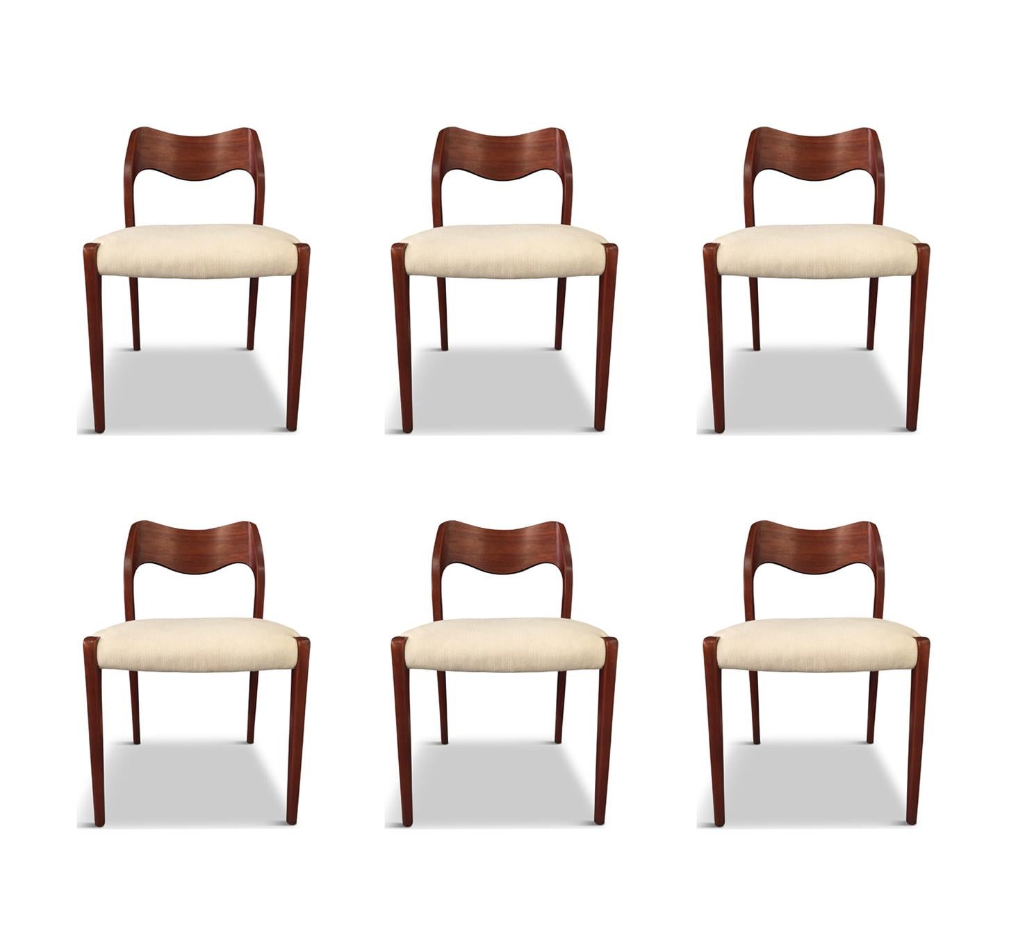 1951 Danish solid teak dining chairs, model 71, by Niels Otto Møller for J. L. Møllers Møbelfabrik upholstered in a textured white velvet. Beautiful teak with natural oil finish. These chairs are in lovely condition with light wear.