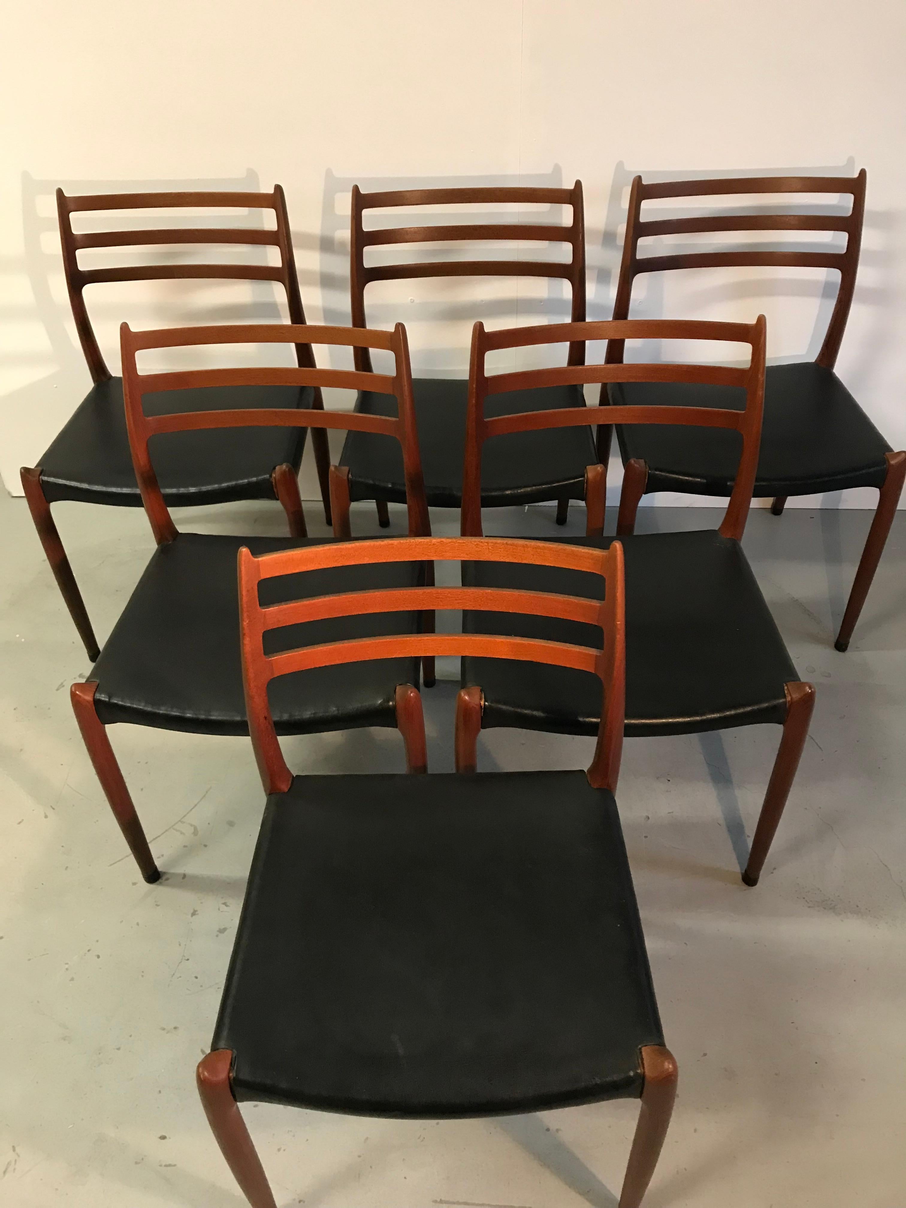 Set of 6 teak dining chairs with black vinyl upholstery model no.78 designed by Niels O.Moller for J.L Moller
The chairs are in good original condition.