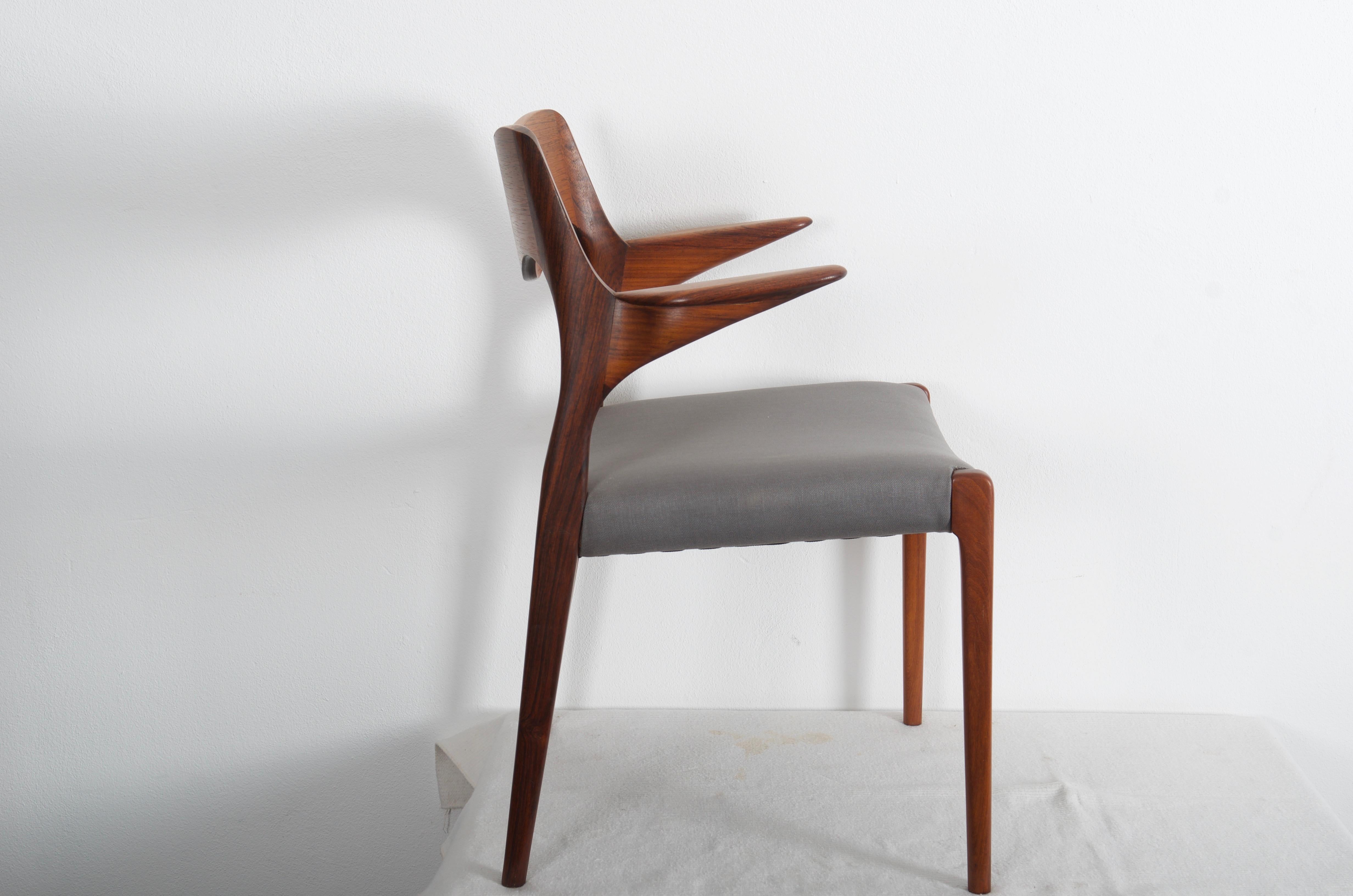 Solid hard wood frame, seat with new upholstered, model 55. Designed in 1951 by Niels Otto Møller and produced by J. L. Møllers Møbelfabrik.
Used but still in a perfect condition.
 