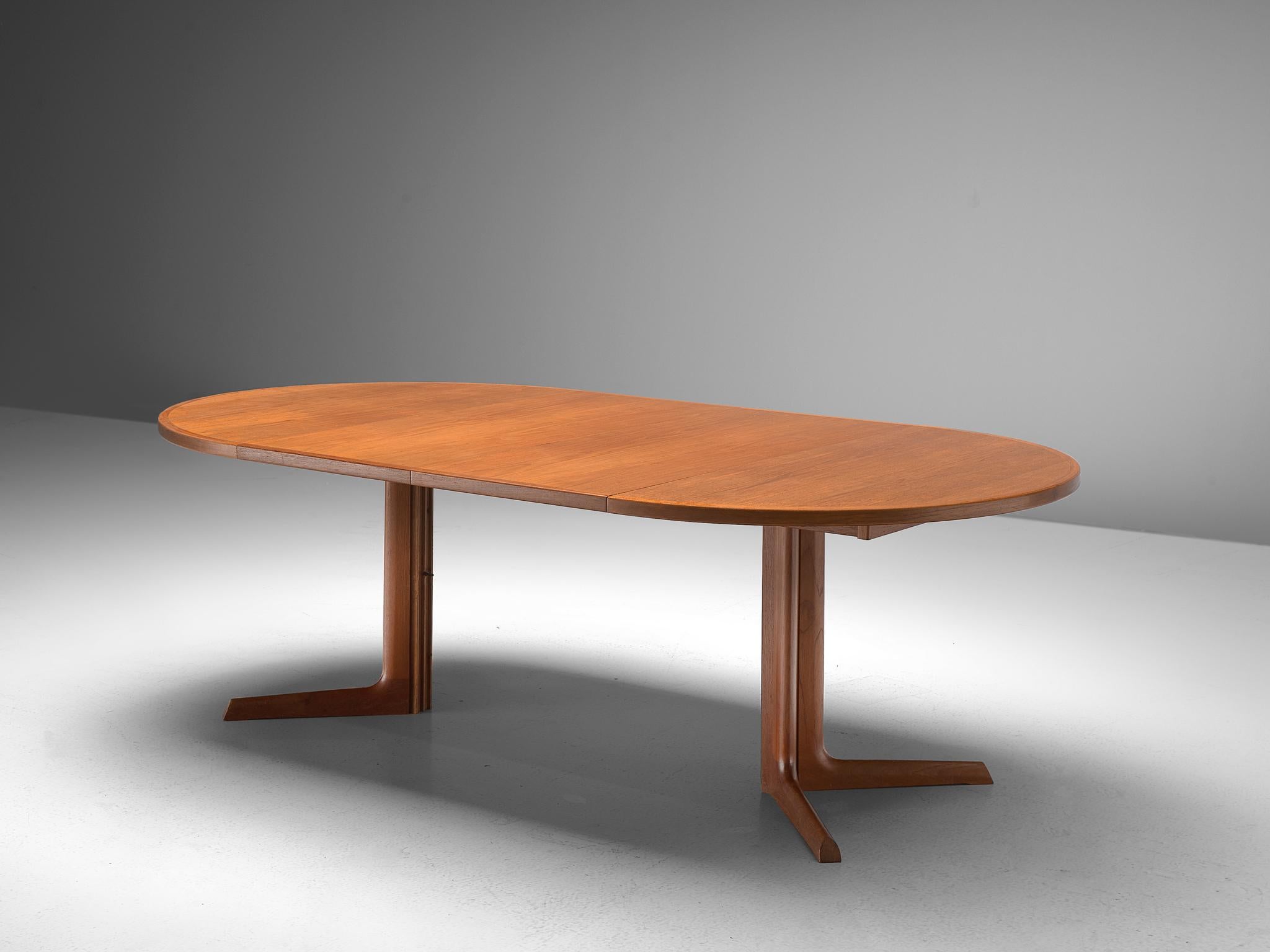 Niels Otto Møller, extendable dining table, teak, Denmark, 1950.

Scandinavian Modern round dining table by Niels O. Møller. The table comes with two additional leafs to make it an oval table of 86.3 inches wide. The table is modest and well