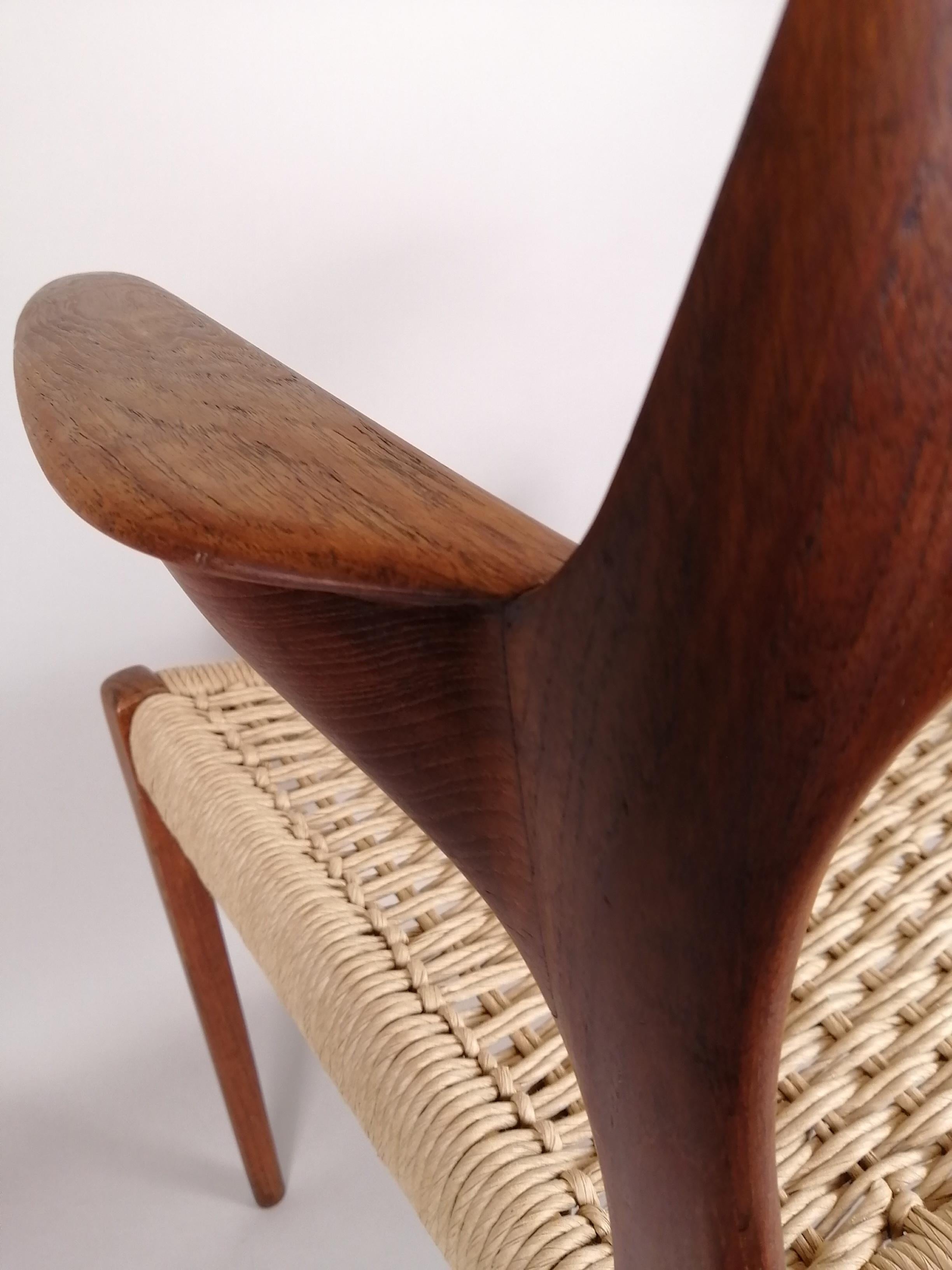 Mid-20th Century Niels Otto Møller for J.L. Møllers Model 55 Teak and Woven Wicker Armchair