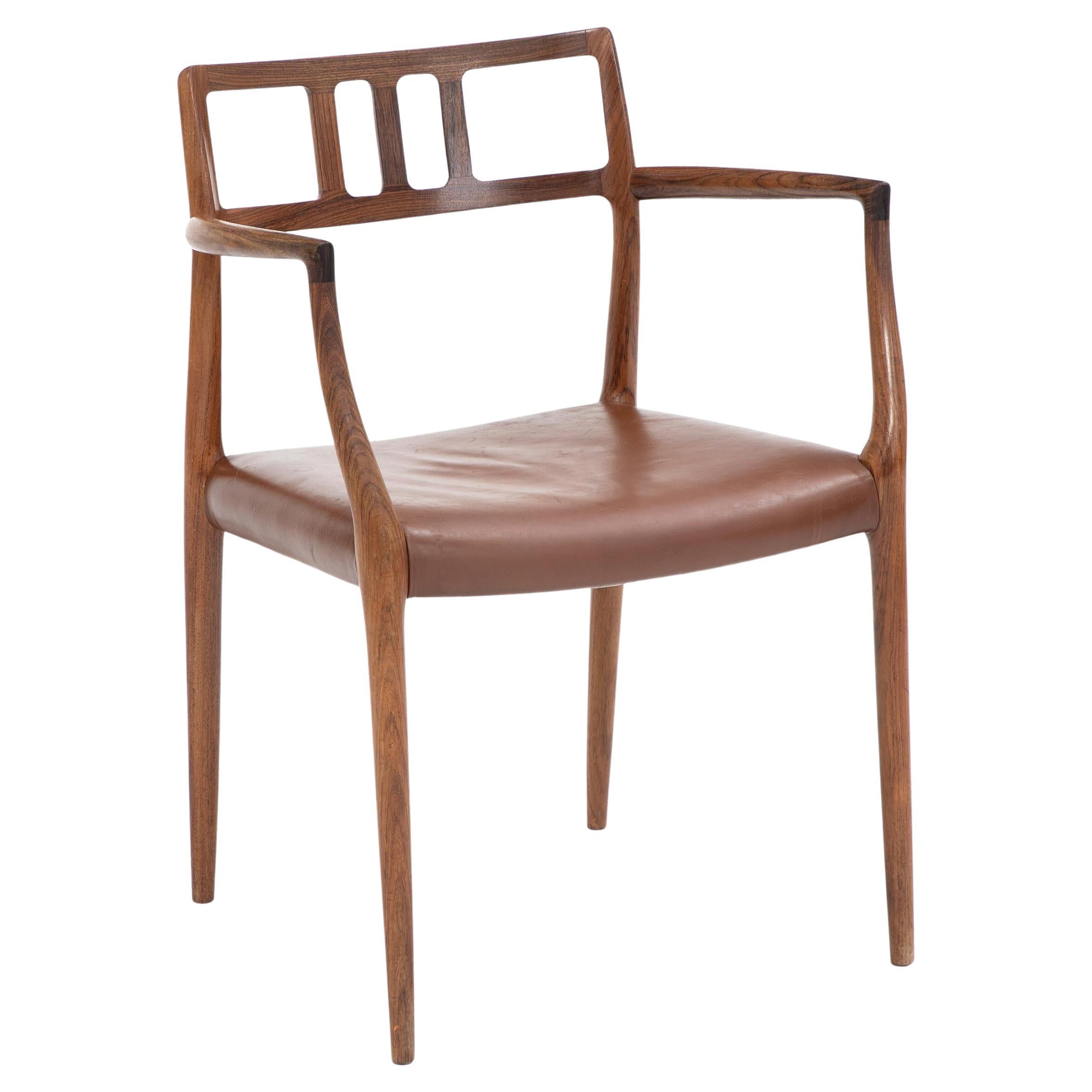 Niels Otto Møller model 64 rosewood armchair. Denamrk 1960s For Sale