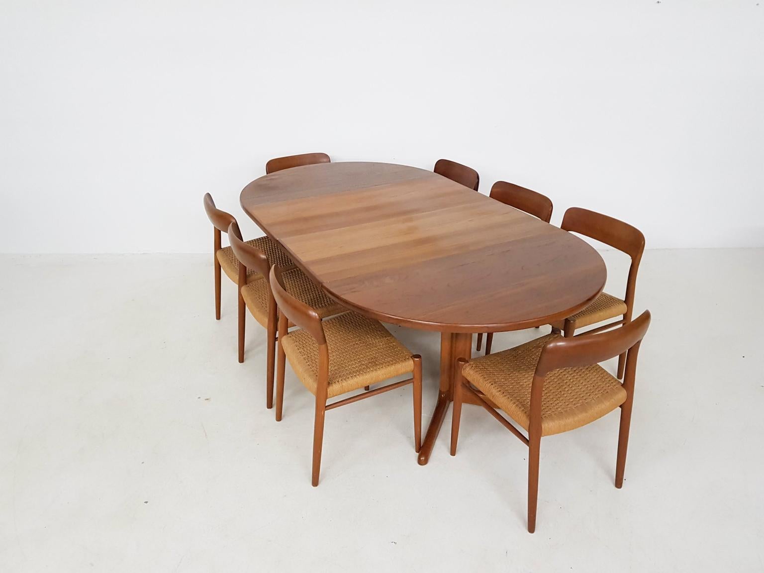 A set of 8 dining chairs designed by Niels Otto Møller. This specific model is number 75 and was made in Denmark in the 1950s. An excellent piece of Classic Danish modern furniture design. And a teak extendable dining table by Skovby Denmark.

The