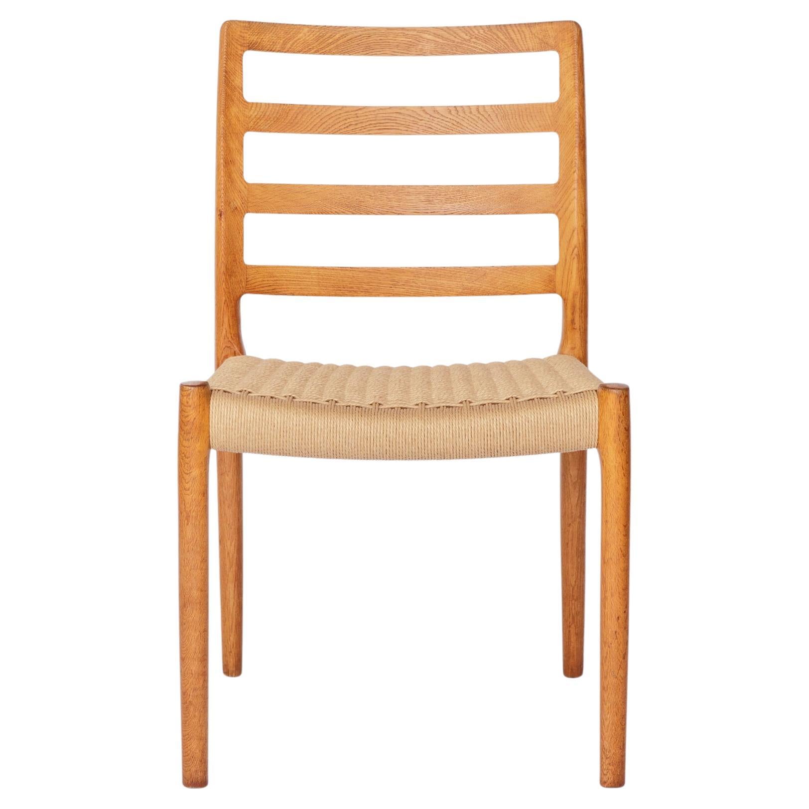 Niels Otto Møller Model 85 Stühle - Eiche, dänische Esszimmerstühle der Jahrhundertmitte, 1980er Jahre