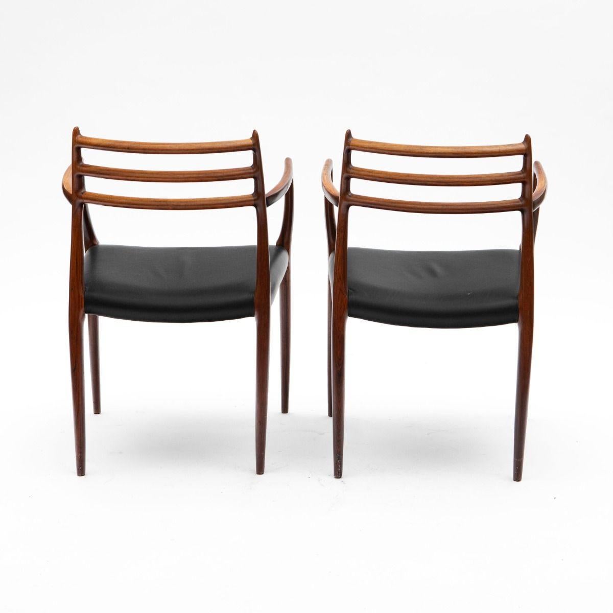 Niels Otto Møller - Paire de fauteuils en palissandre et cuir noir Modèle 62 Bon état - En vente à Kastrup, DK