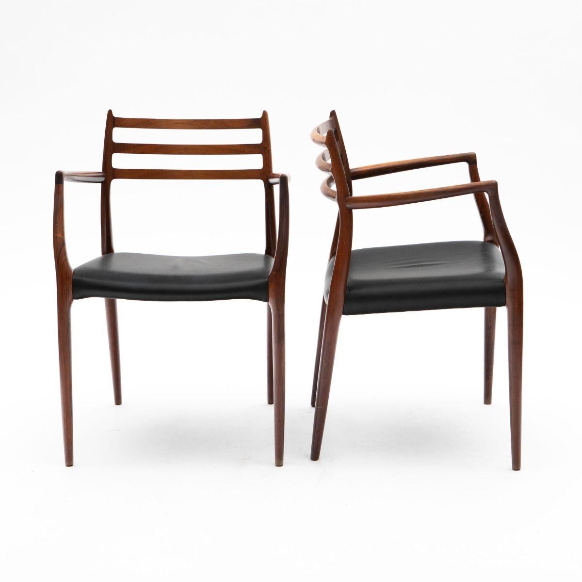 Cuir Niels Otto Møller - Paire de fauteuils en palissandre et cuir noir Modèle 62 en vente