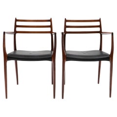 Niels Otto Møller - Pareja de sillones de palisandro y cuero negro Model 62