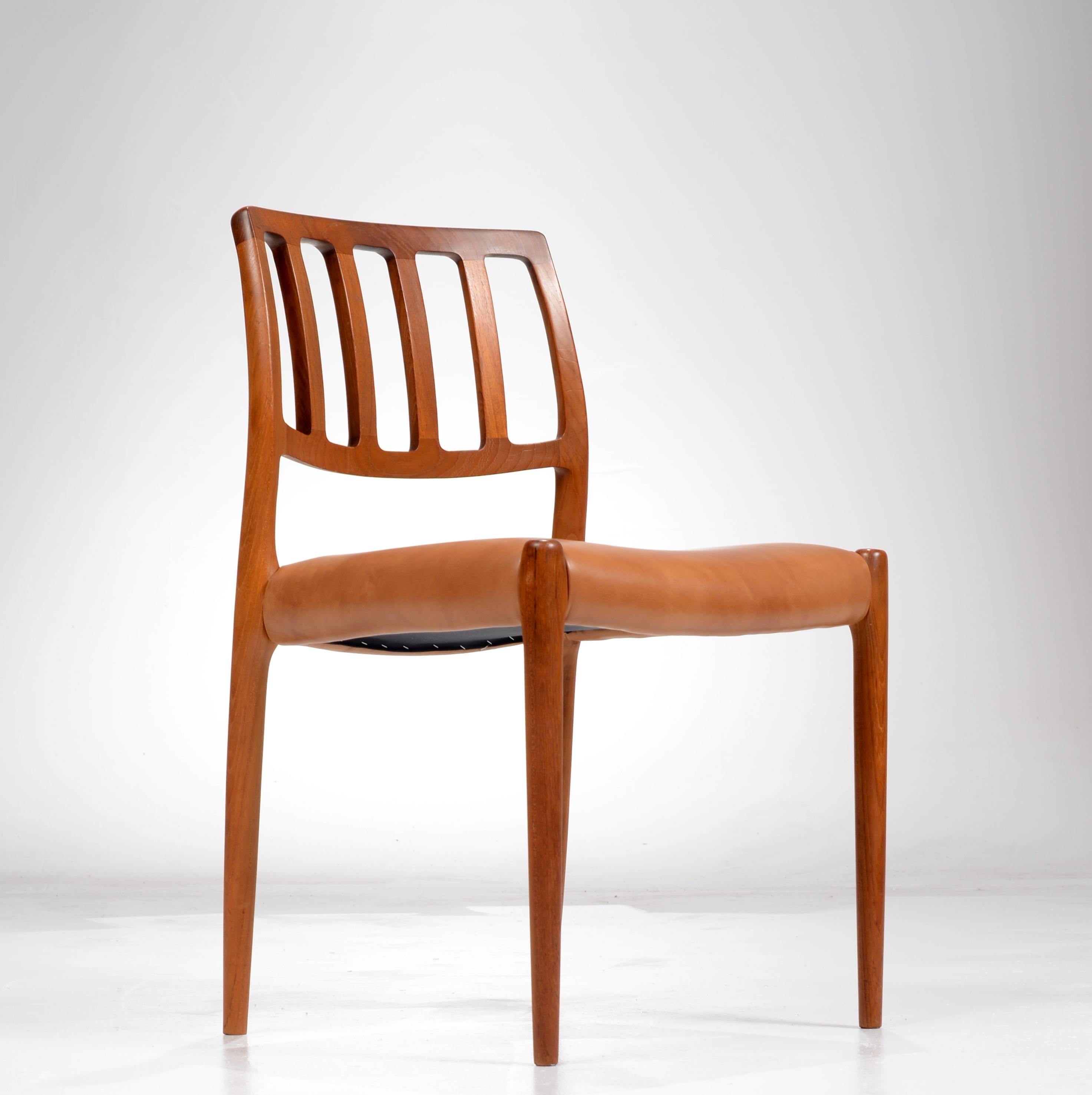 Set of six dining chairs designed by Niels O. Møller for J.L Møller Møbelfabrik in Denmark model 83, in teak and leather.
Newly upholstered and restored, all chairs marked.  