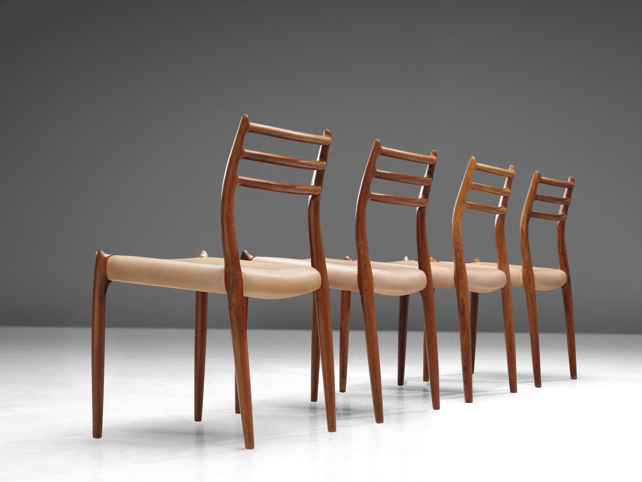 Niels Otto Moller, for J.L. Møllers Møbelfabrik, set of four dining chairs 'model nr. 78', in rosewood and leather, Denmark, 1960s.

Set of four rosewood dining chairs with different upholsteries, with our without armrests. This design, 'model nr.