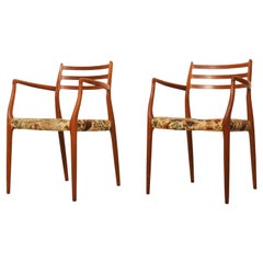 Poltrone in teak Niels Otto Møller Modello 62