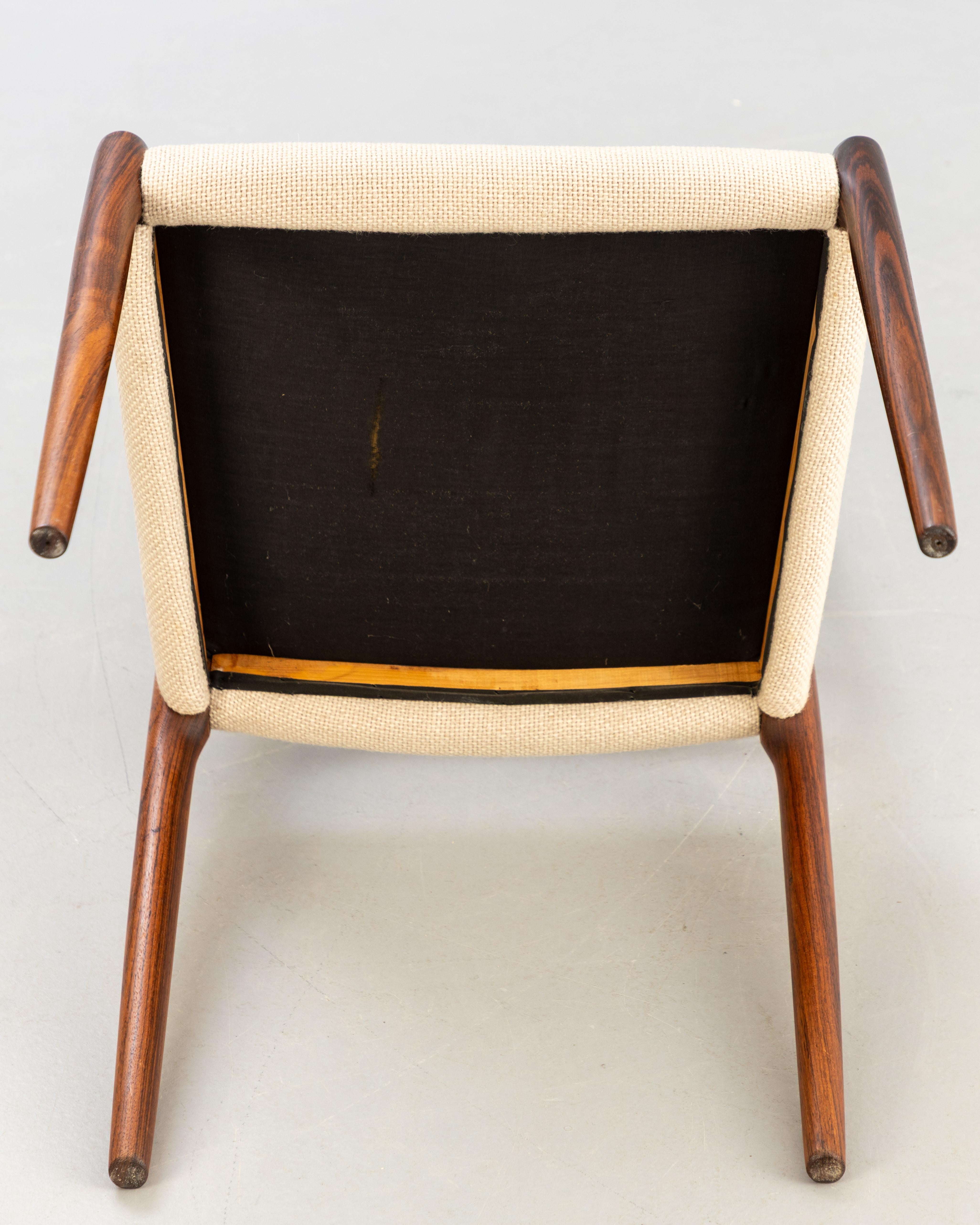 4 'Model 82' chairs by Niels Otto Moller for J.L. Moller furniture factory made in Denmark,  around 1960. Solid East Indian rosewood frame and upholstered seat covered with beige fabric.
Each approx. H 95 cm x H 47 cm x W 50 cm x D 50 cm
East Indian
