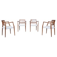 Niels Otto Moller armchairs # 66 in rosewood and bouclé Denmark 1974
