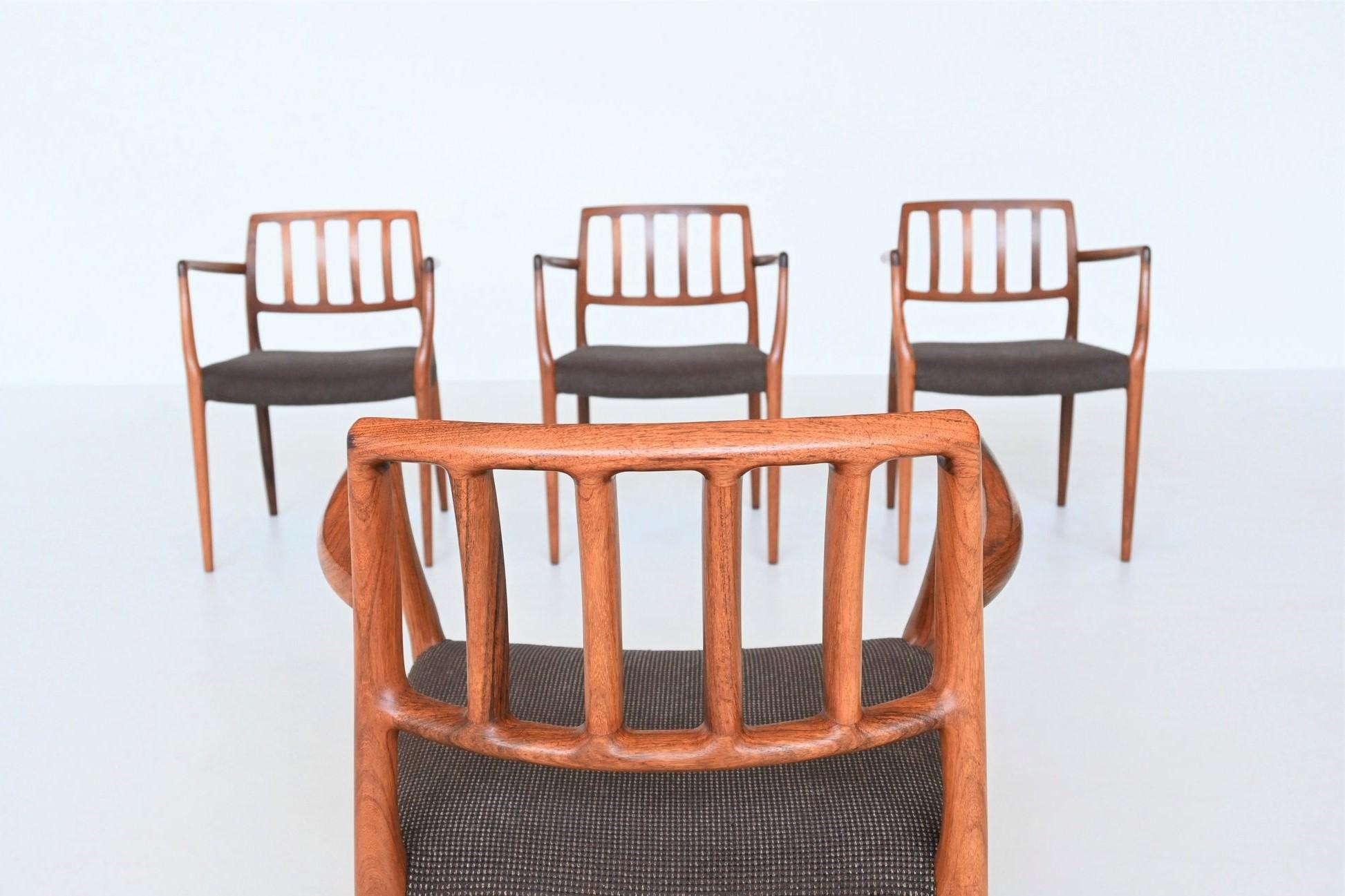 Fabric Niels Otto Moller armchairs model 66 in walnut Denmark 1974