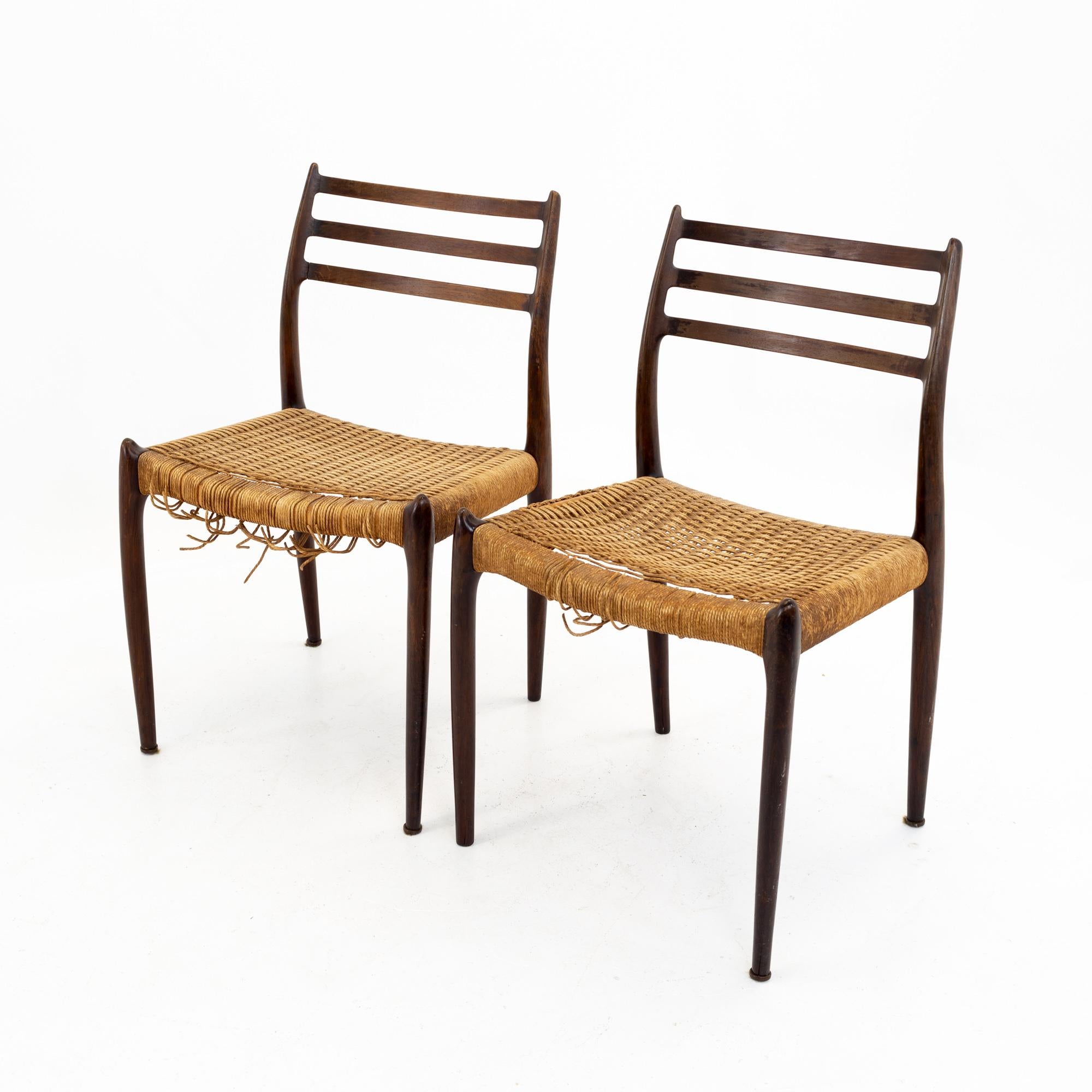 Niels Otto Moller mid century Danish rosewood dining chairs - pair
These chairs are 19.75 wide x 17.5 deep x 32.25 high, and a seat height of18.75 inches

All pieces of furniture can be had in what we call restored vintage condition. That means
