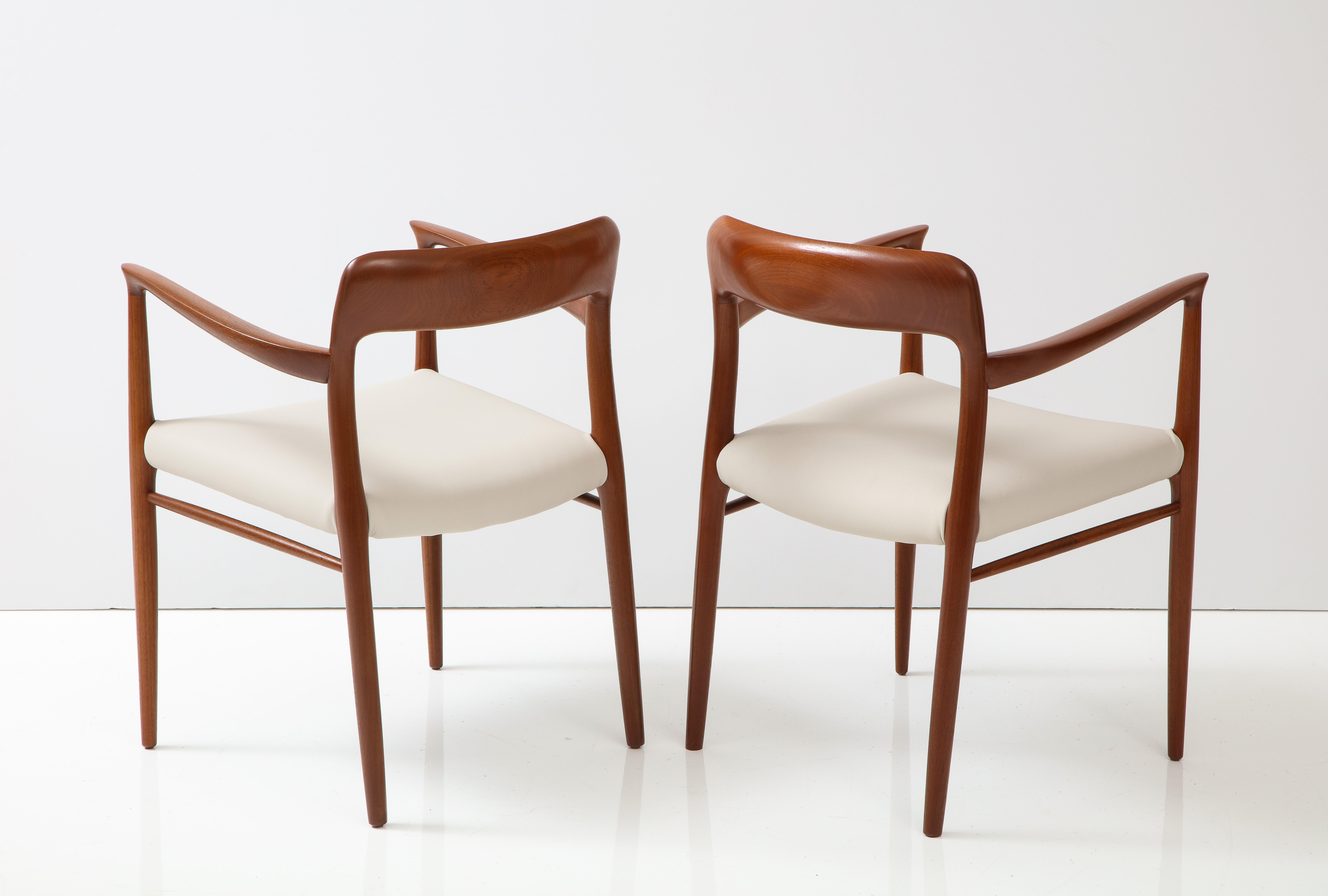 1950's mid-century modern Danish teak and leather dining/side chairs designed by Niels Otto Moller model #56, fully restored and re-upholstered in off white leather, with minor wear and patina due to age and use.