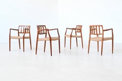 NIels Otto Moller model 66 armchairs teak and paper cord Denmark 1974