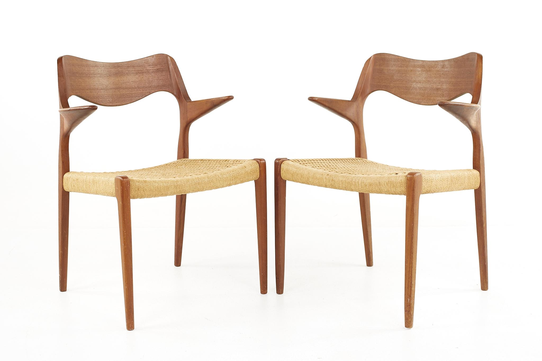 Niels Otto Moller Model 71 teak and paper cord armchairs - A Pair

Each chair measures: 24 wide x 21 deep x 30.75 high, with a seat height of 17.5 inches and arm height/chair clearance of 25.75 inches

All pieces of furniture can be had in what