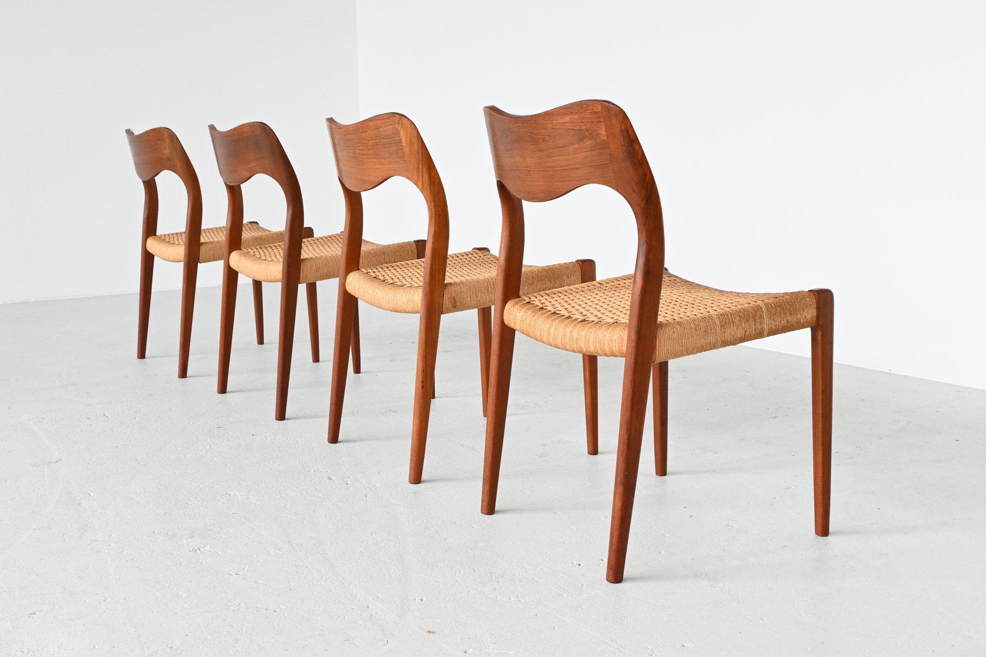 Very nice set of 4 dining chairs model 71 designed by Niels Otto Moller and manufactured by J.L. Møller Mobelfabrik, Denmark 1951. These beautiful shaped Scandinavian chairs are made of solid teak wood and they have original paper cord seats. They
