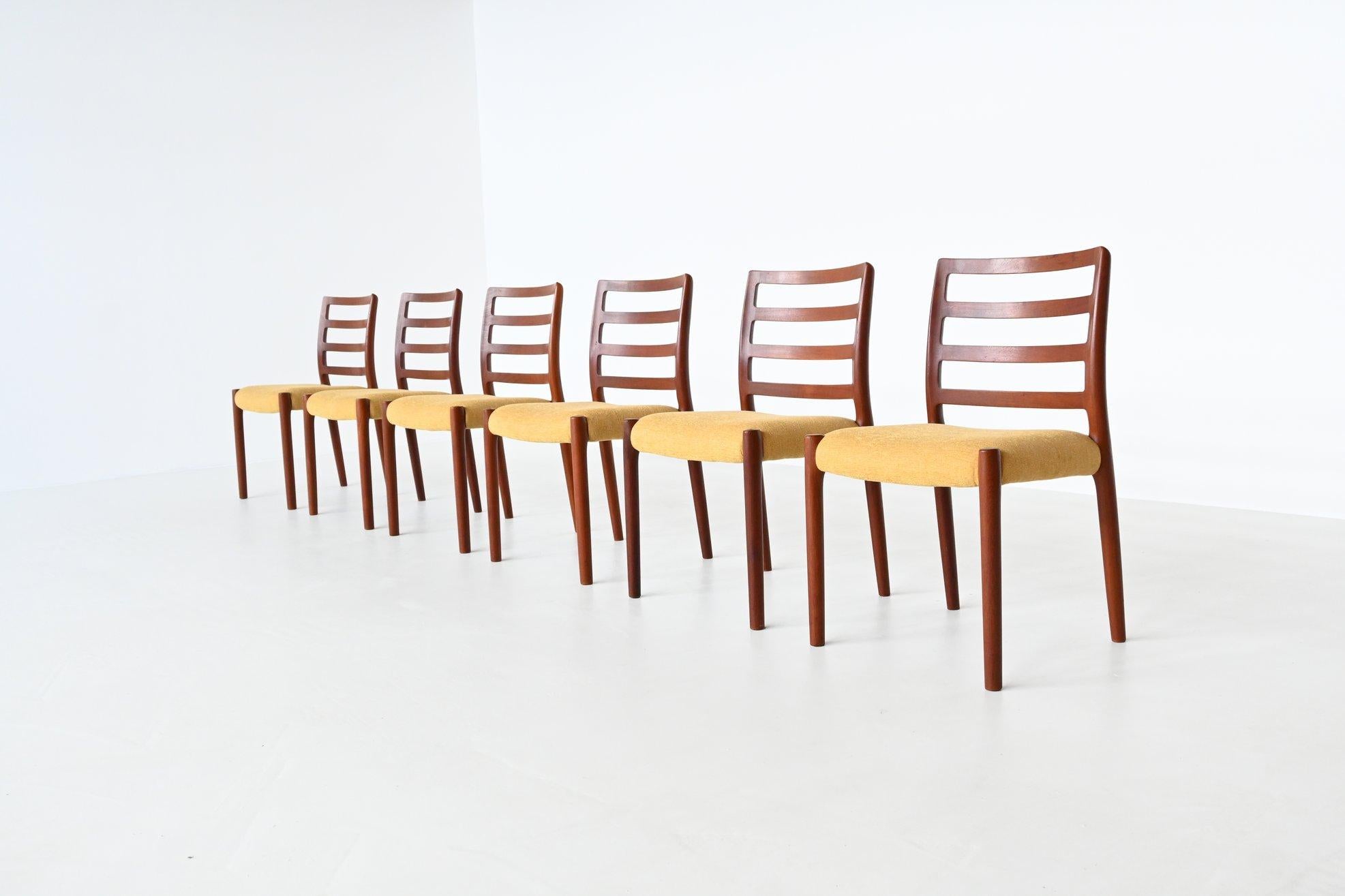 Very nice set of six dining chairs model 85 designed by Niels Otto Møller and manufactured by J.L. Møller Mobelfabrik, Denmark 1960. They are made of solid teak wood and the seats are upholstered with yellow wool fabric. These beautiful shaped
