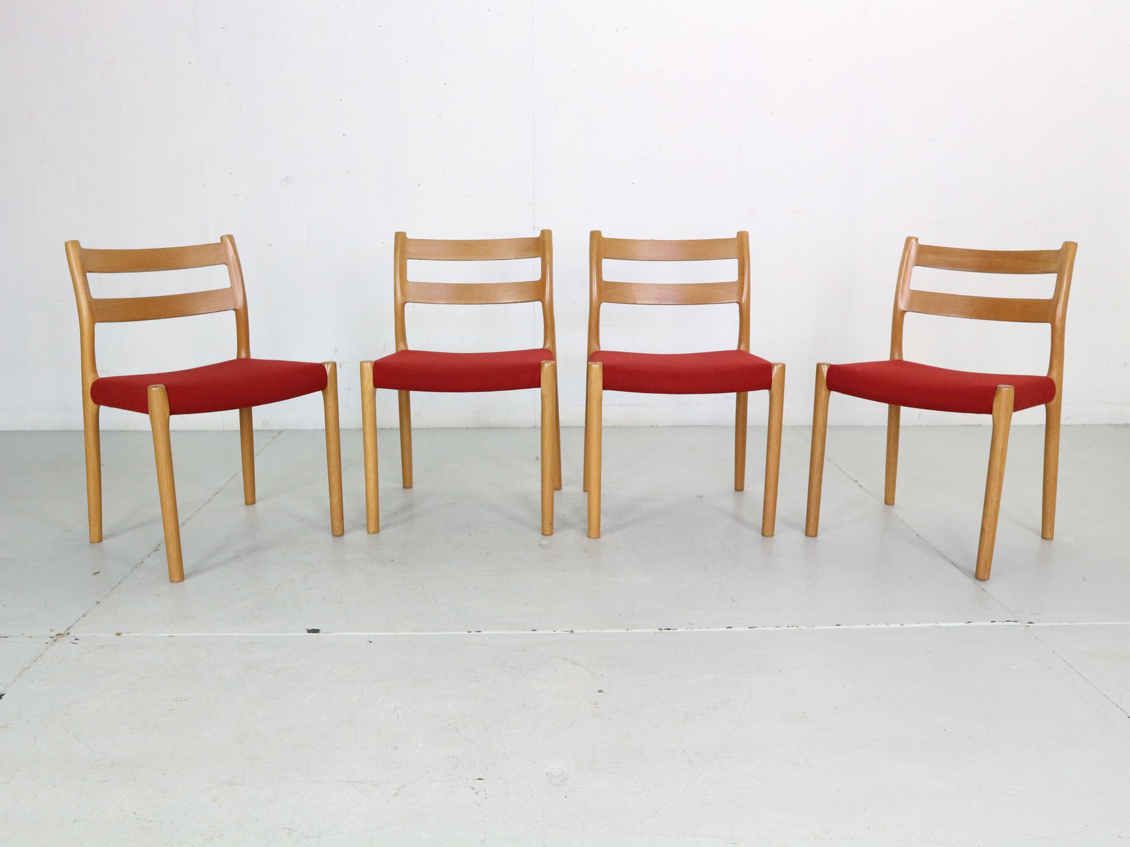 Mid Century Modern period set of 4 dining chairs designed by Niels Otto Møller in the 1970s and produced by J.L. Møller in Denmark.
These chairs are made of solid beech wooden frame and original kvadrat fabric.
The branded set is in a very good